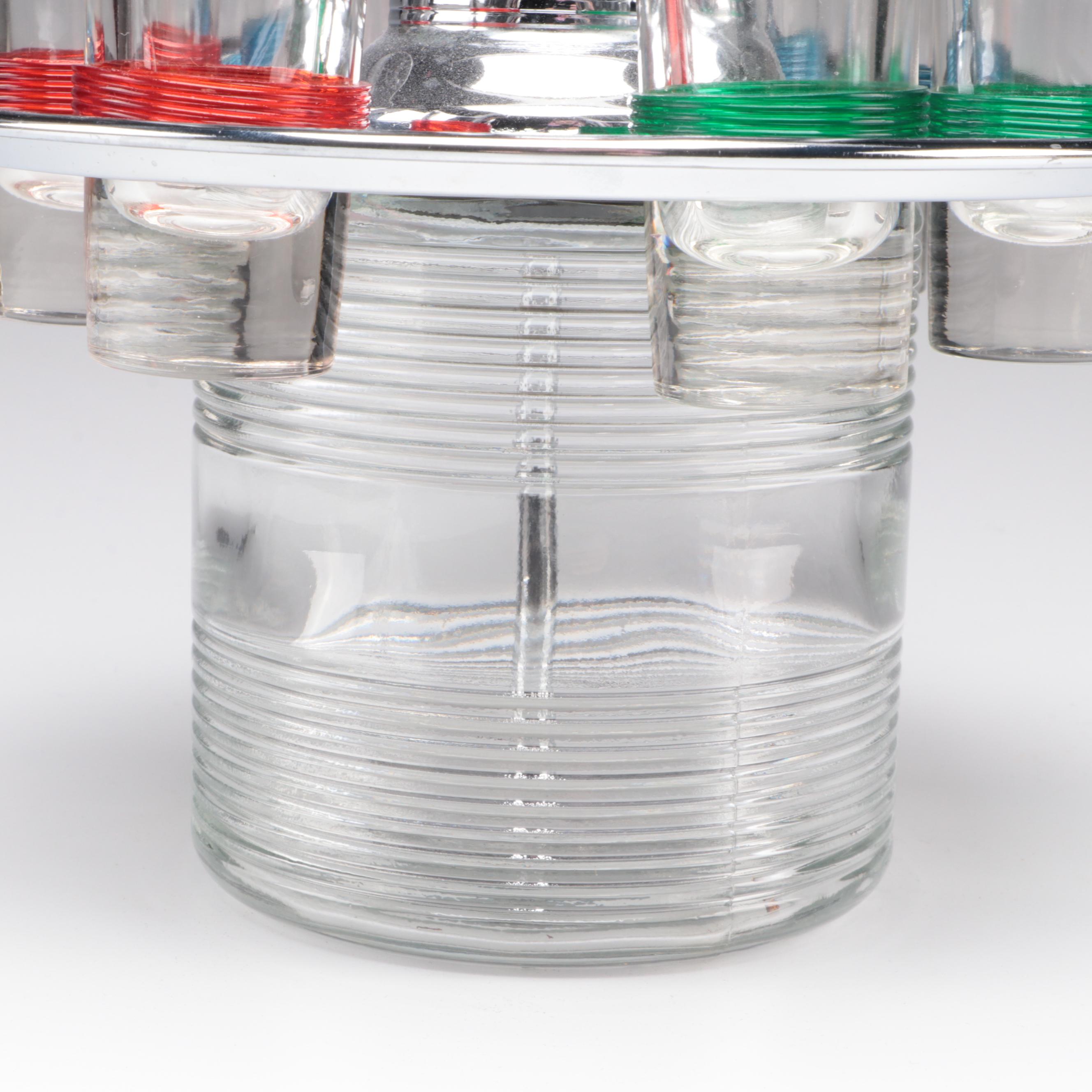 Mid Century Modern Glass and Chrome Pump Decanter with Shot Glass Carousel Tray