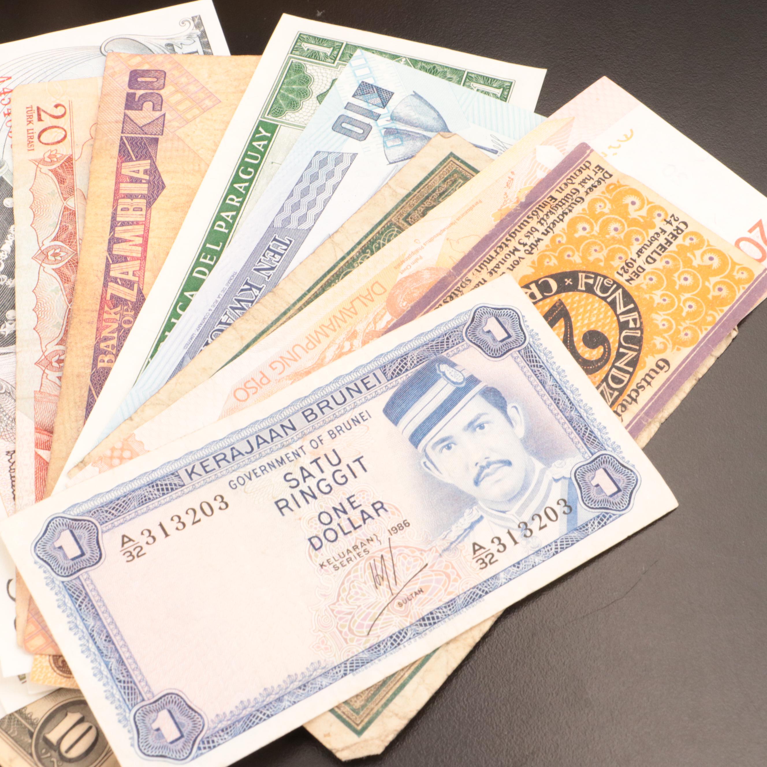 Over 520 Foreign Coins and 25 Foreign Currency Notes