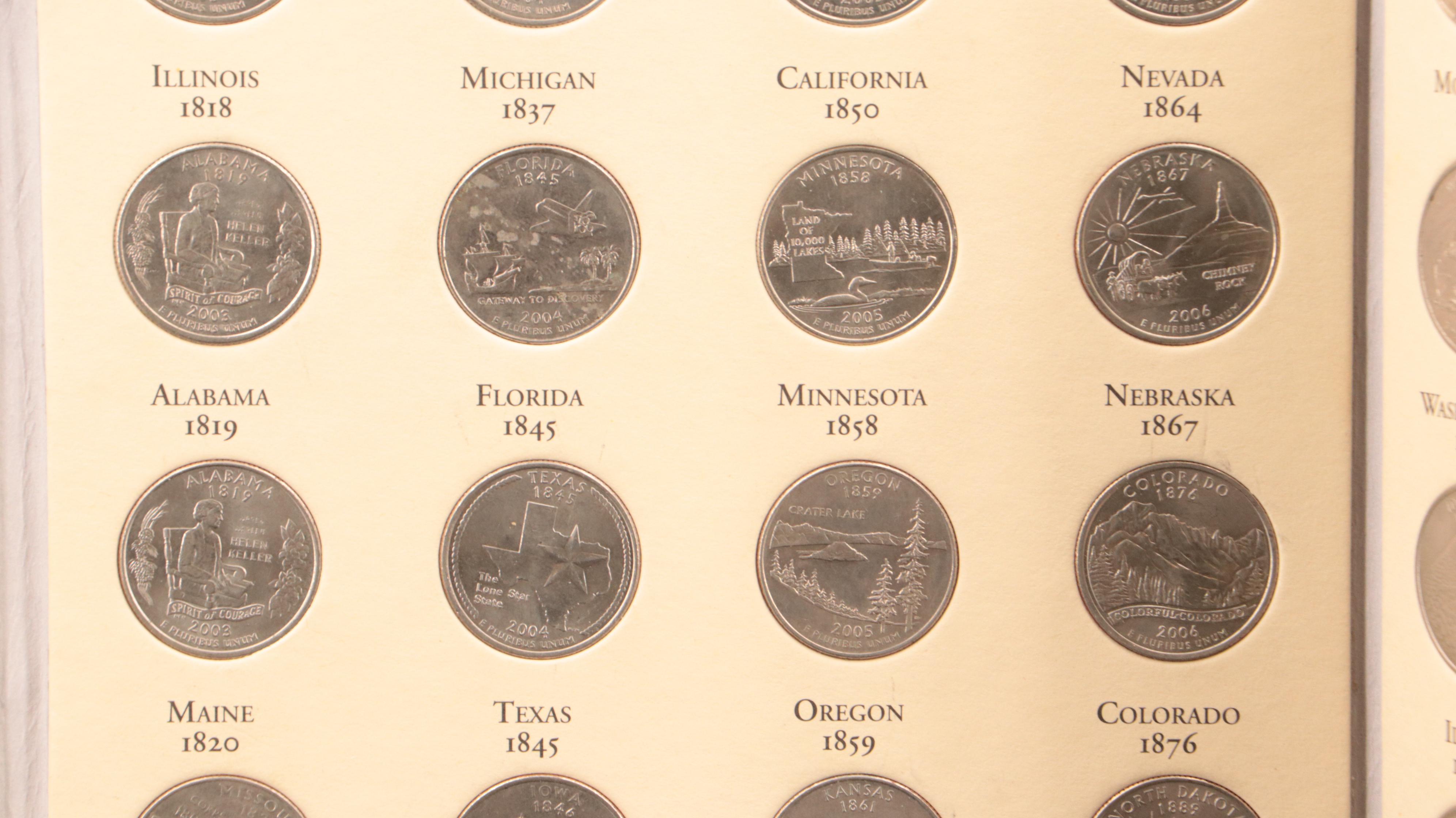 Three Littleton Binders of Statehood and National Parks Quarters