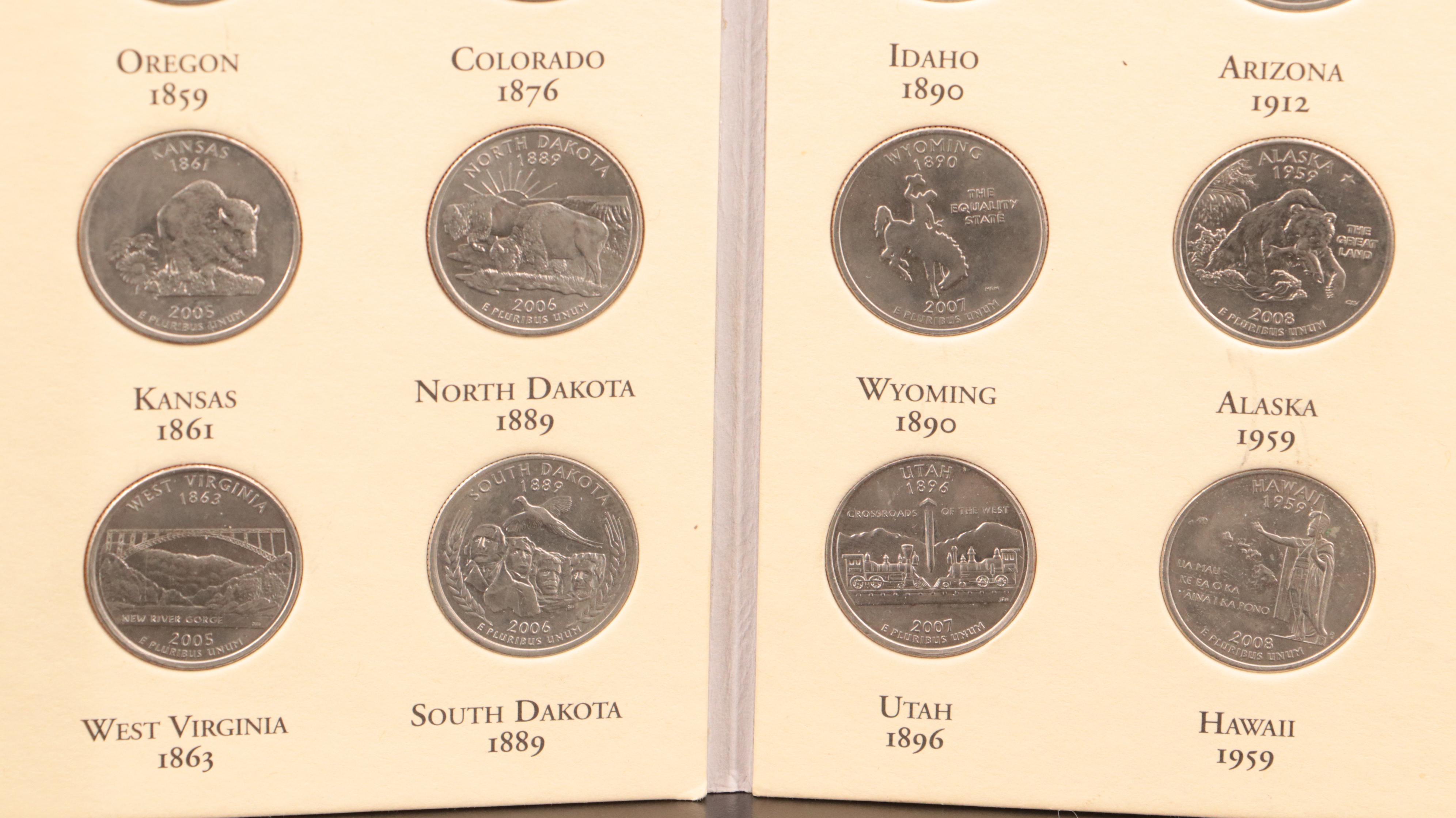 Three Littleton Binders of Statehood and National Parks Quarters