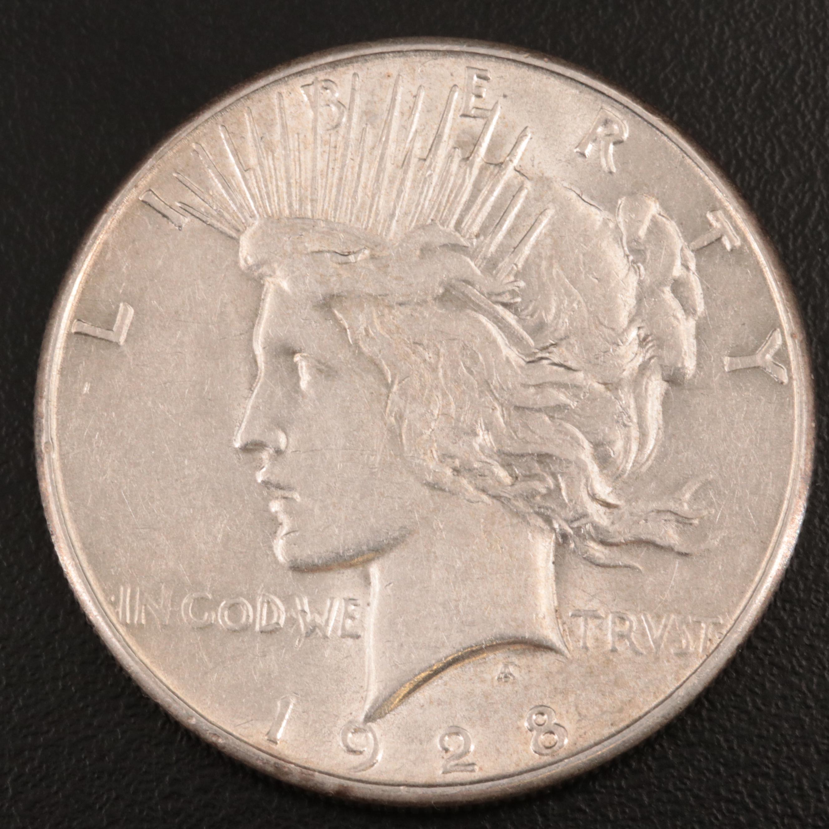 Three Peace Silver Dollars Including 1934-D