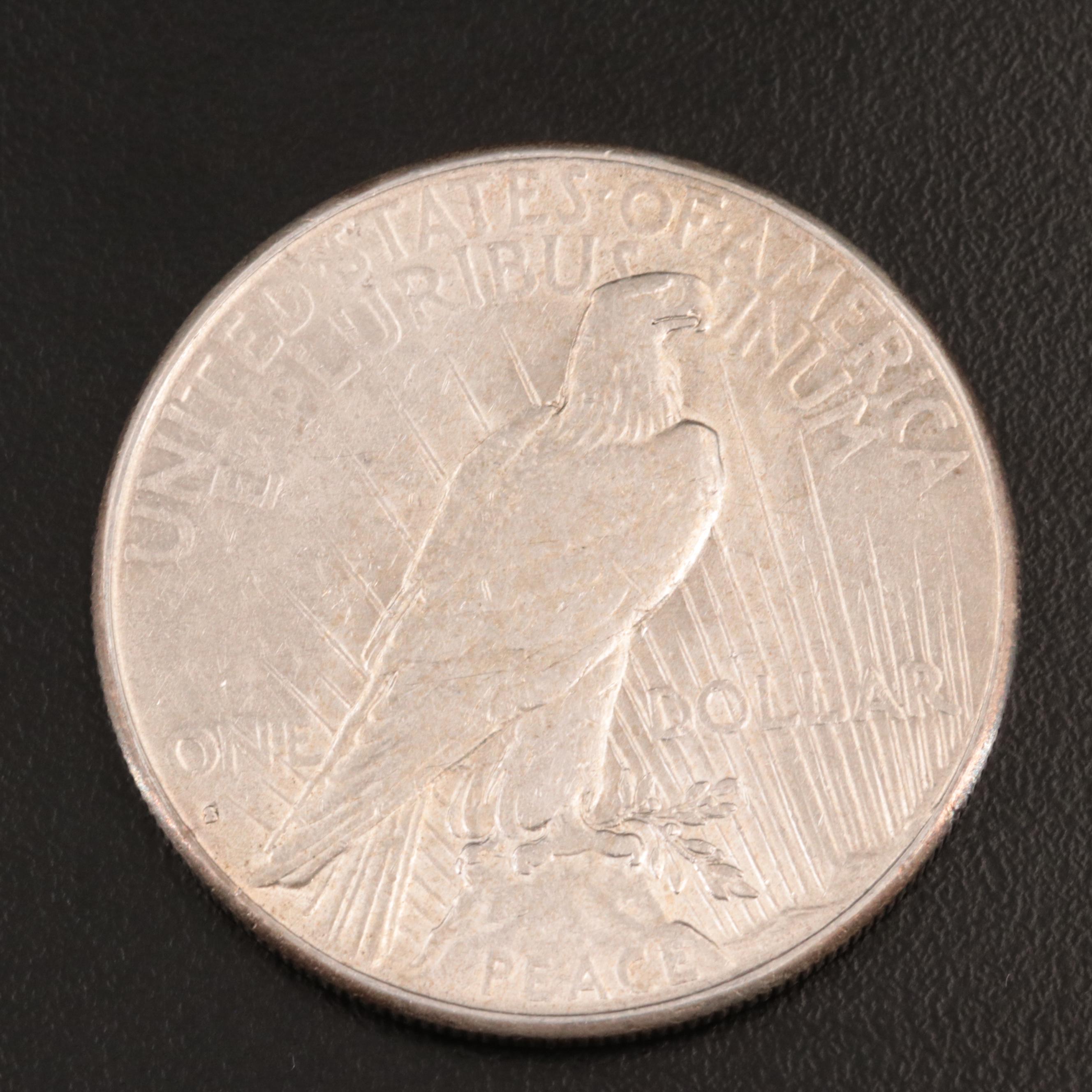 Three Peace Silver Dollars Including 1934-D
