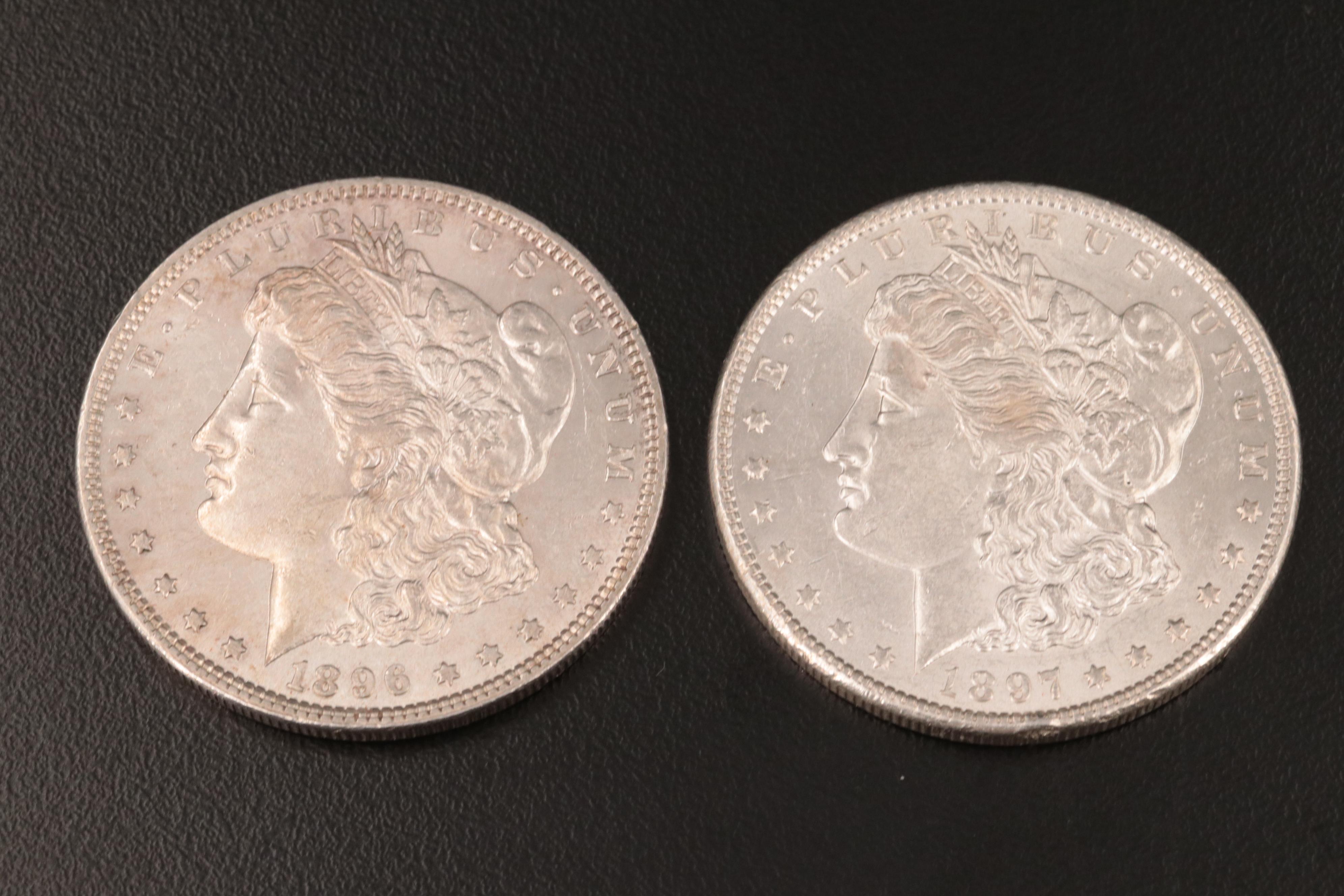 Four Morgan Silver Dollars Including 1896