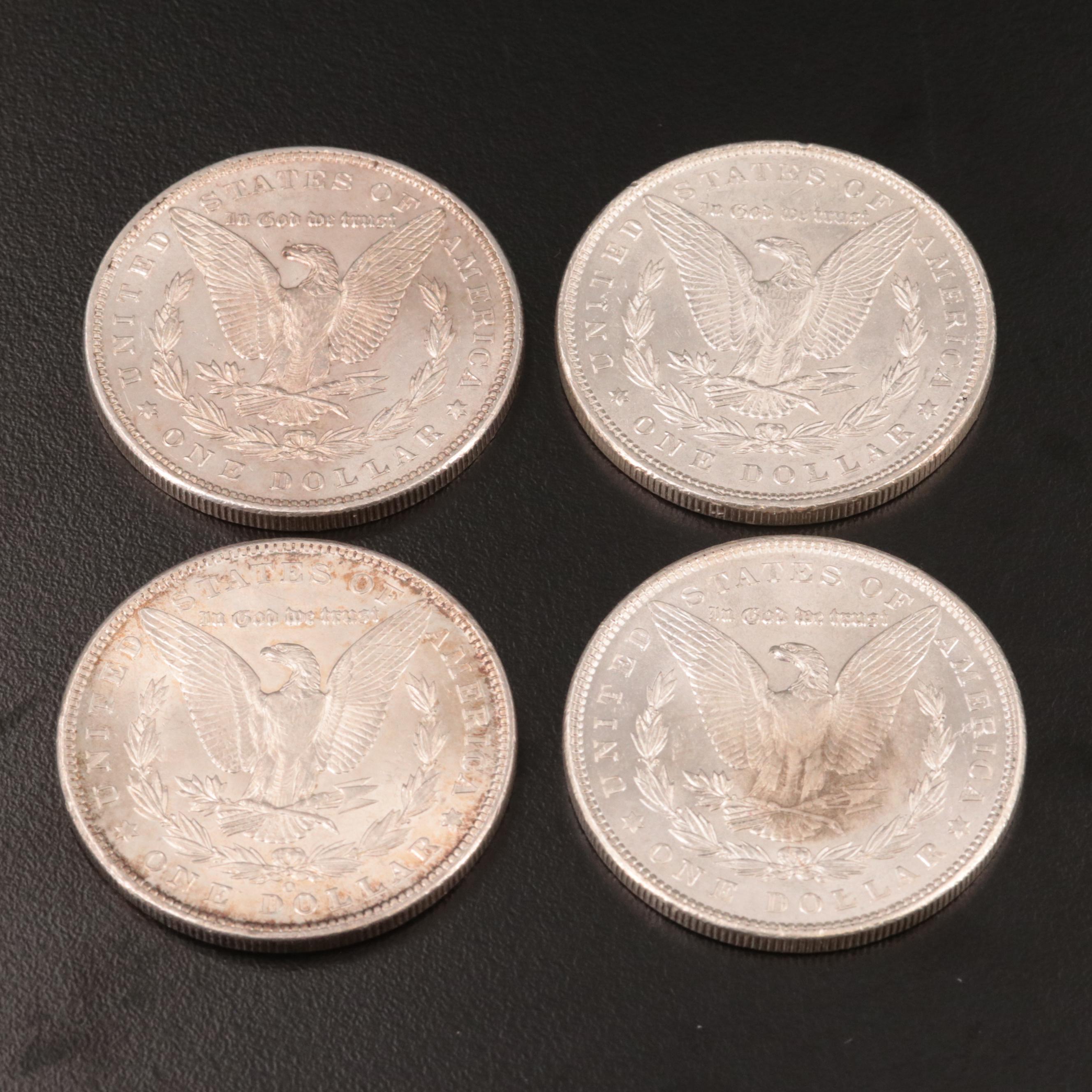 Four Morgan Silver Dollars Including 1896