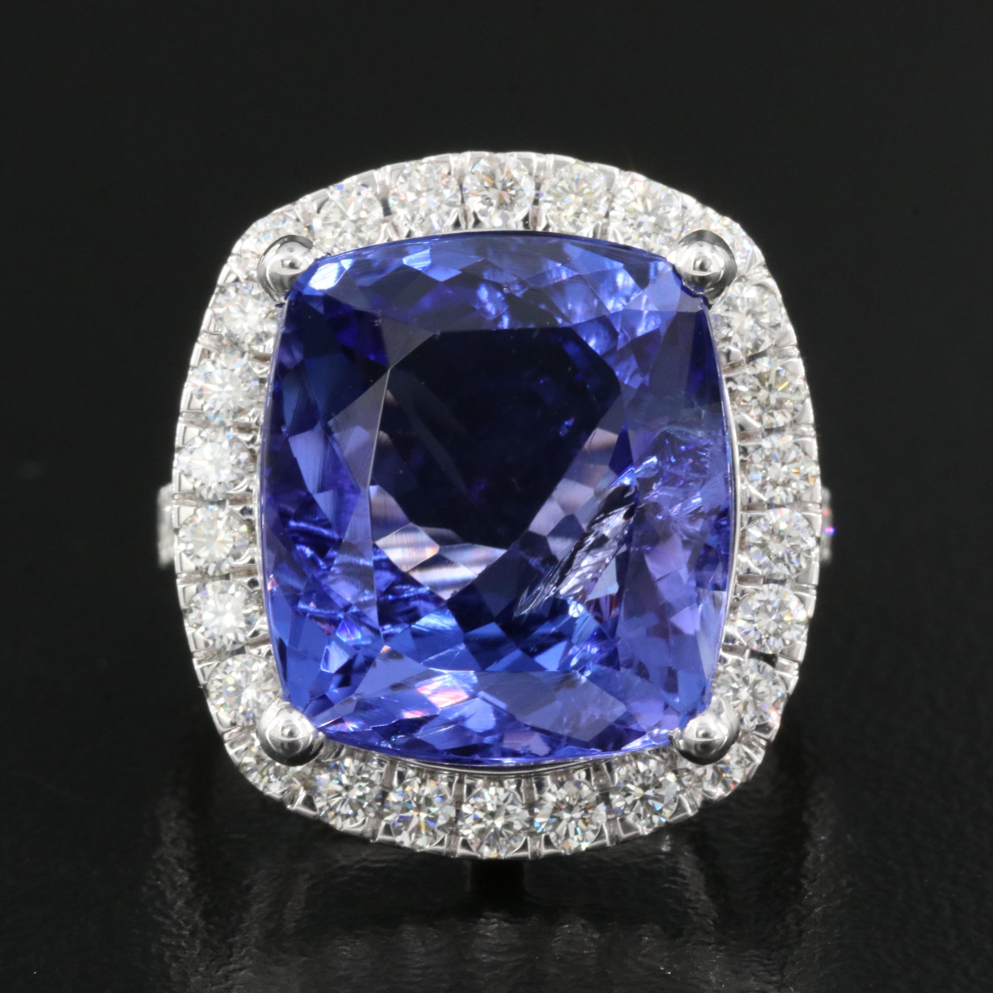 18K 15.57 CT Tanzanite and 1.00 CTW Diamond Halo Ring