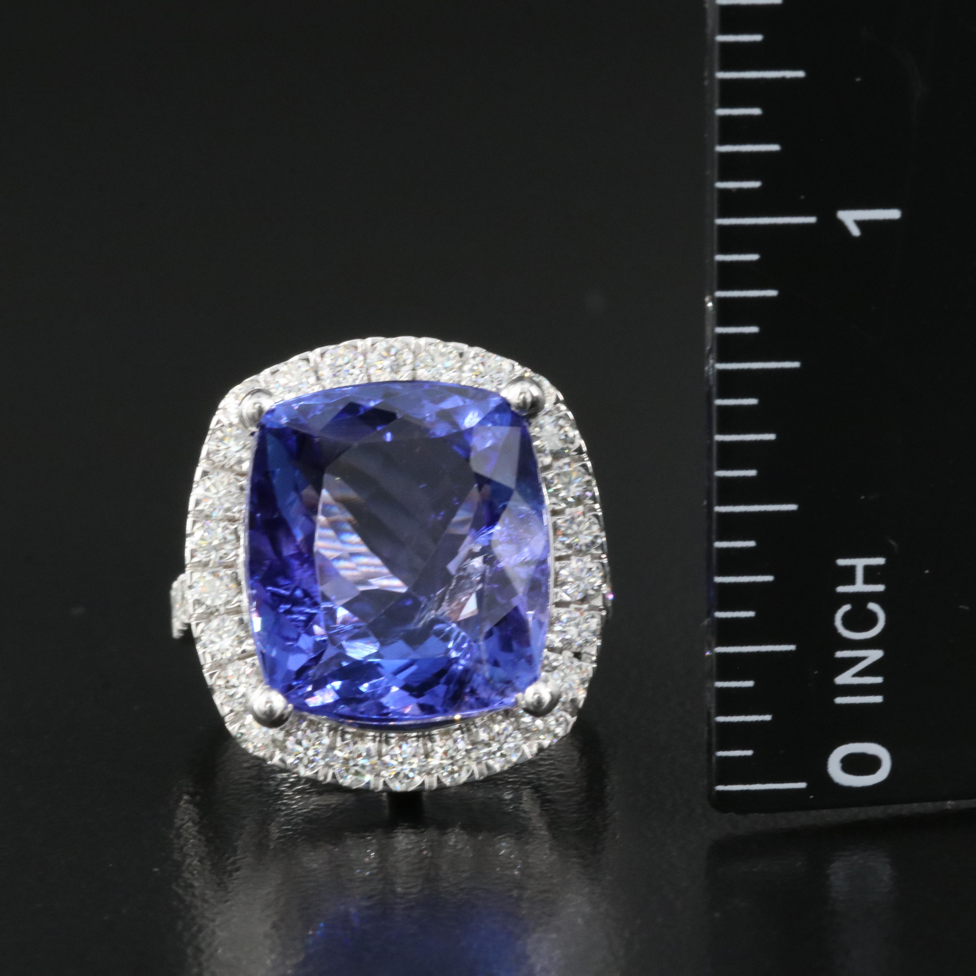 18K 15.57 CT Tanzanite and 1.00 CTW Diamond Halo Ring
