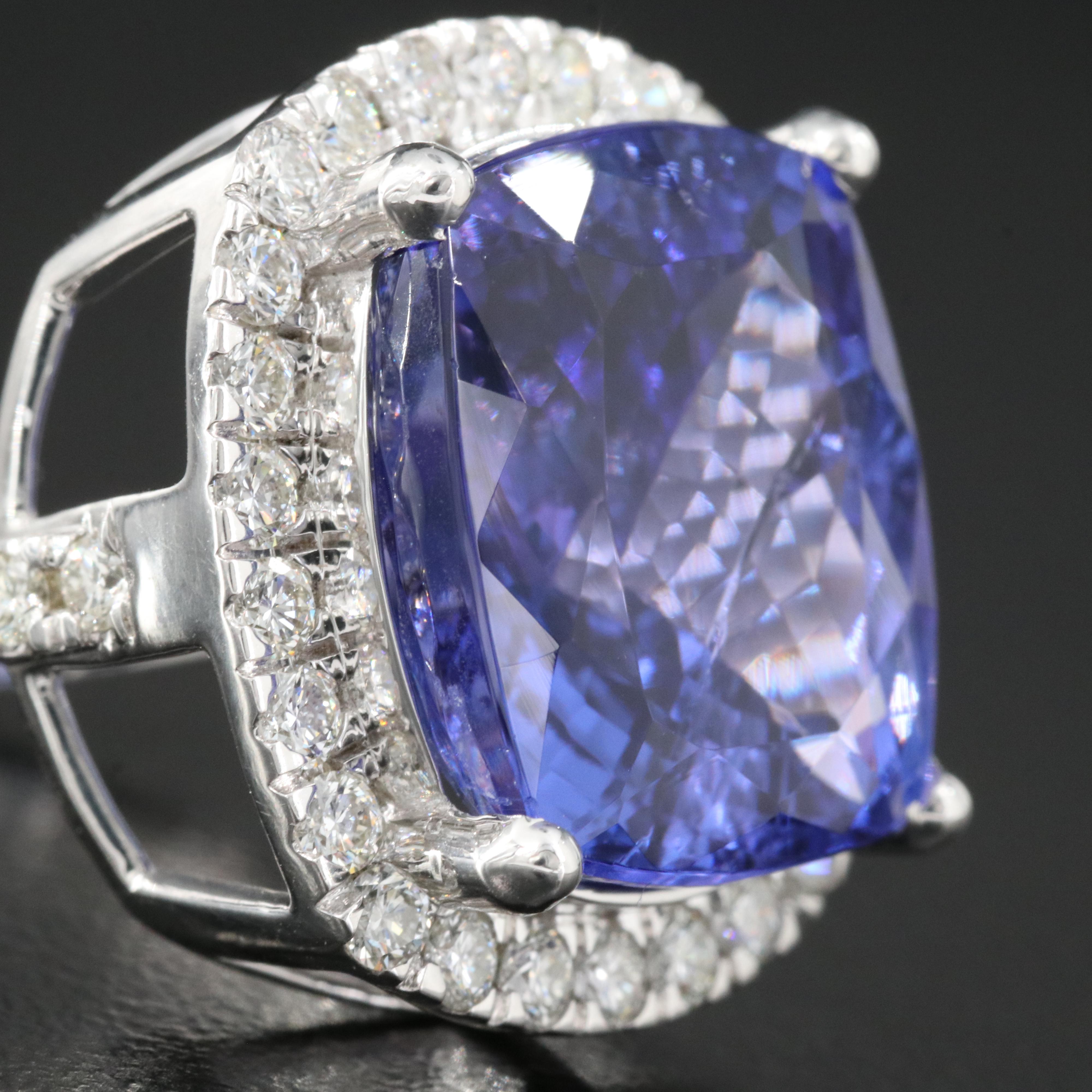 18K 15.57 CT Tanzanite and 1.00 CTW Diamond Halo Ring