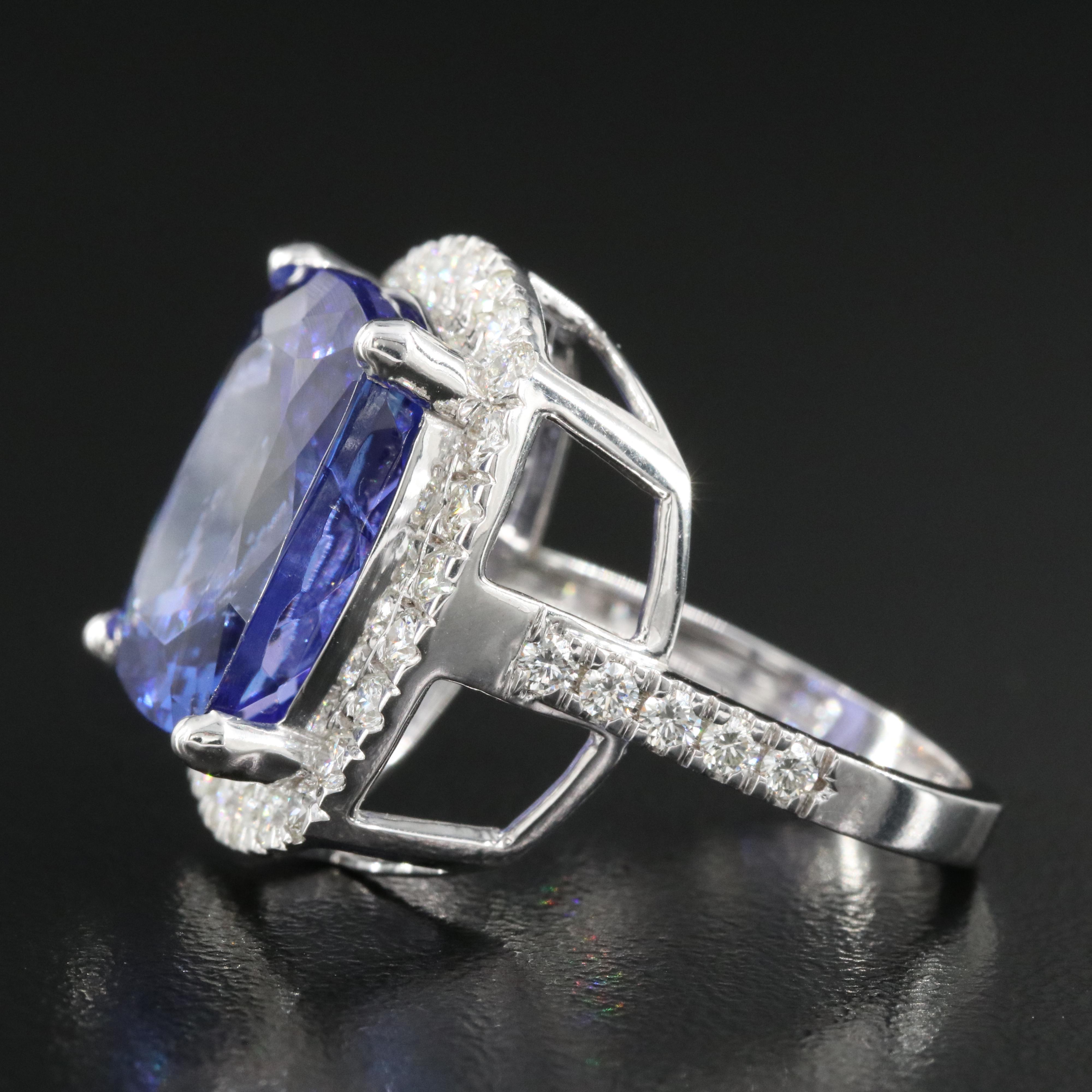 18K 15.57 CT Tanzanite and 1.00 CTW Diamond Halo Ring