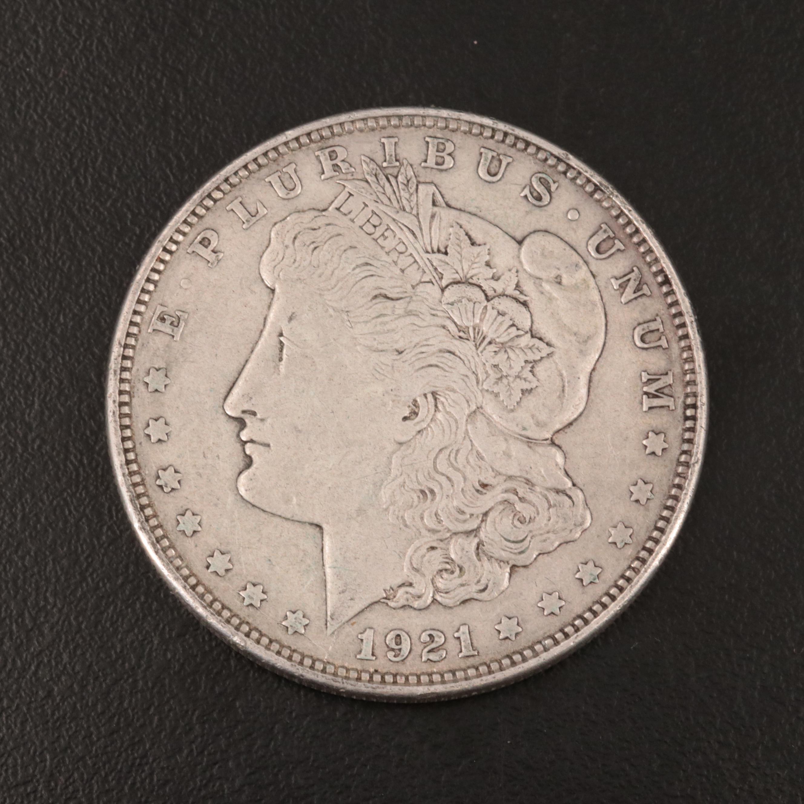 Five Morgan Silver Dollars