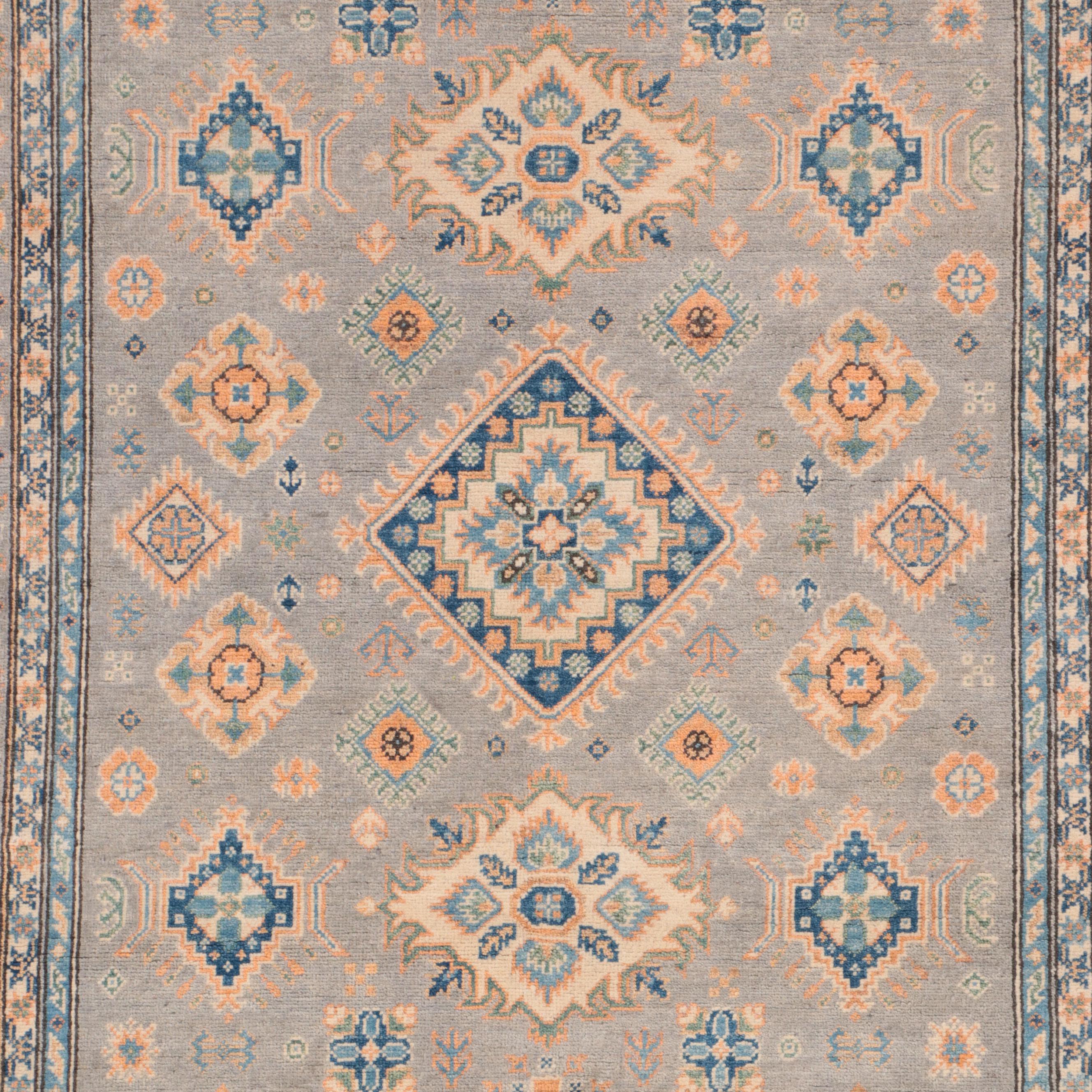 4'9 x 7' Hand-Knotted Pakistani Kazak-Style Area Rug