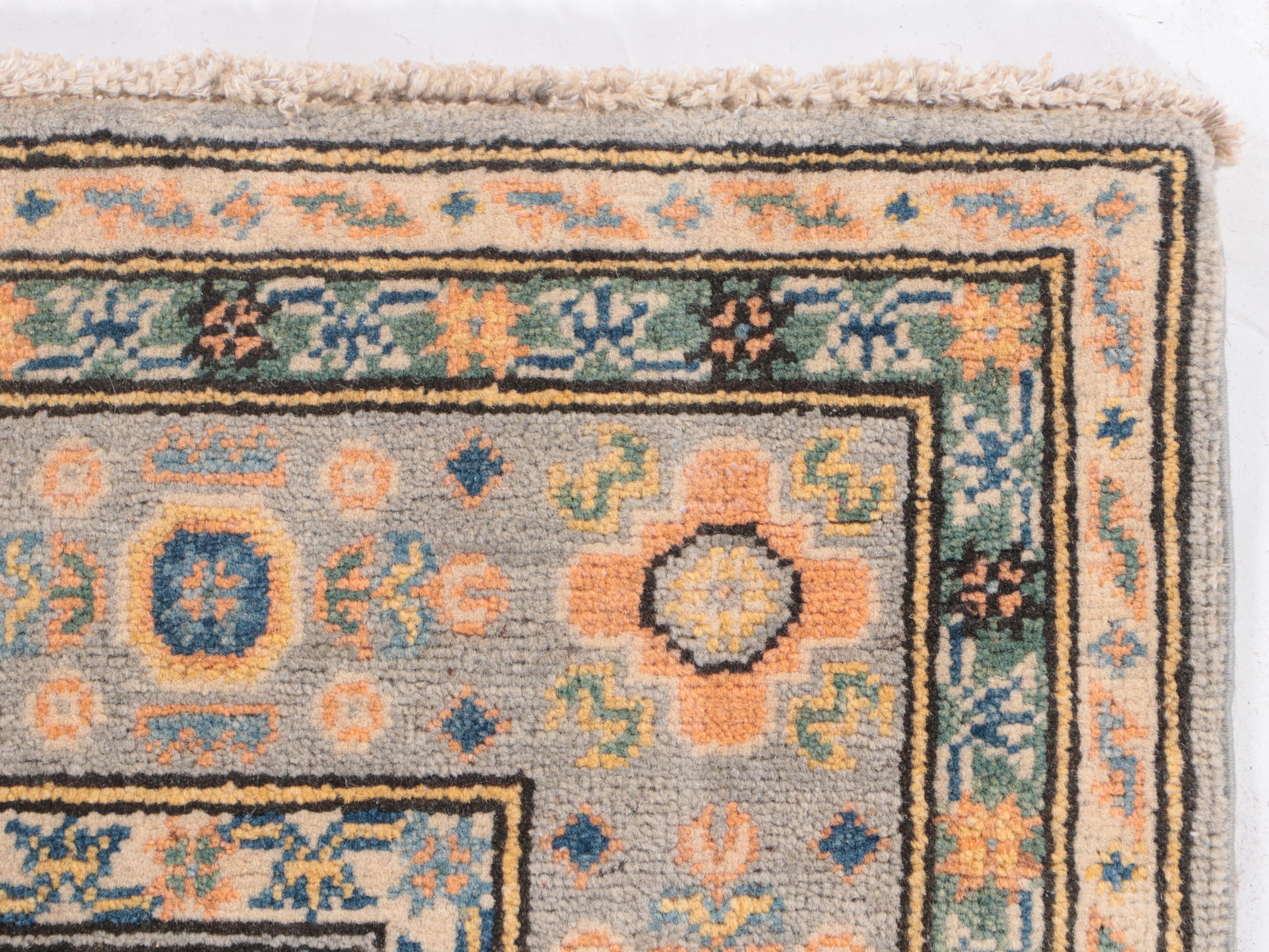 4'9 x 7' Hand-Knotted Pakistani Kazak-Style Area Rug