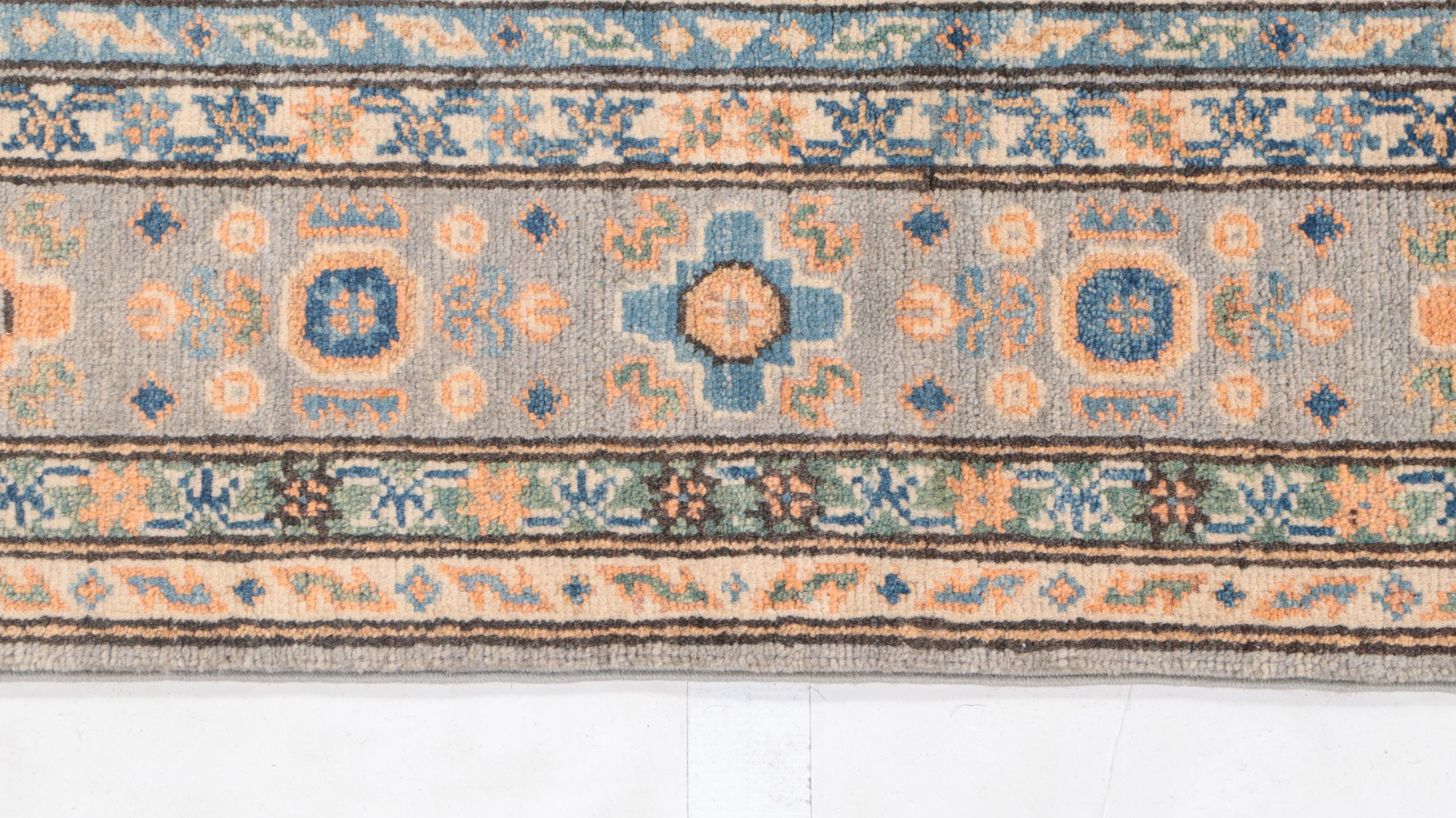 4'9 x 7' Hand-Knotted Pakistani Kazak-Style Area Rug