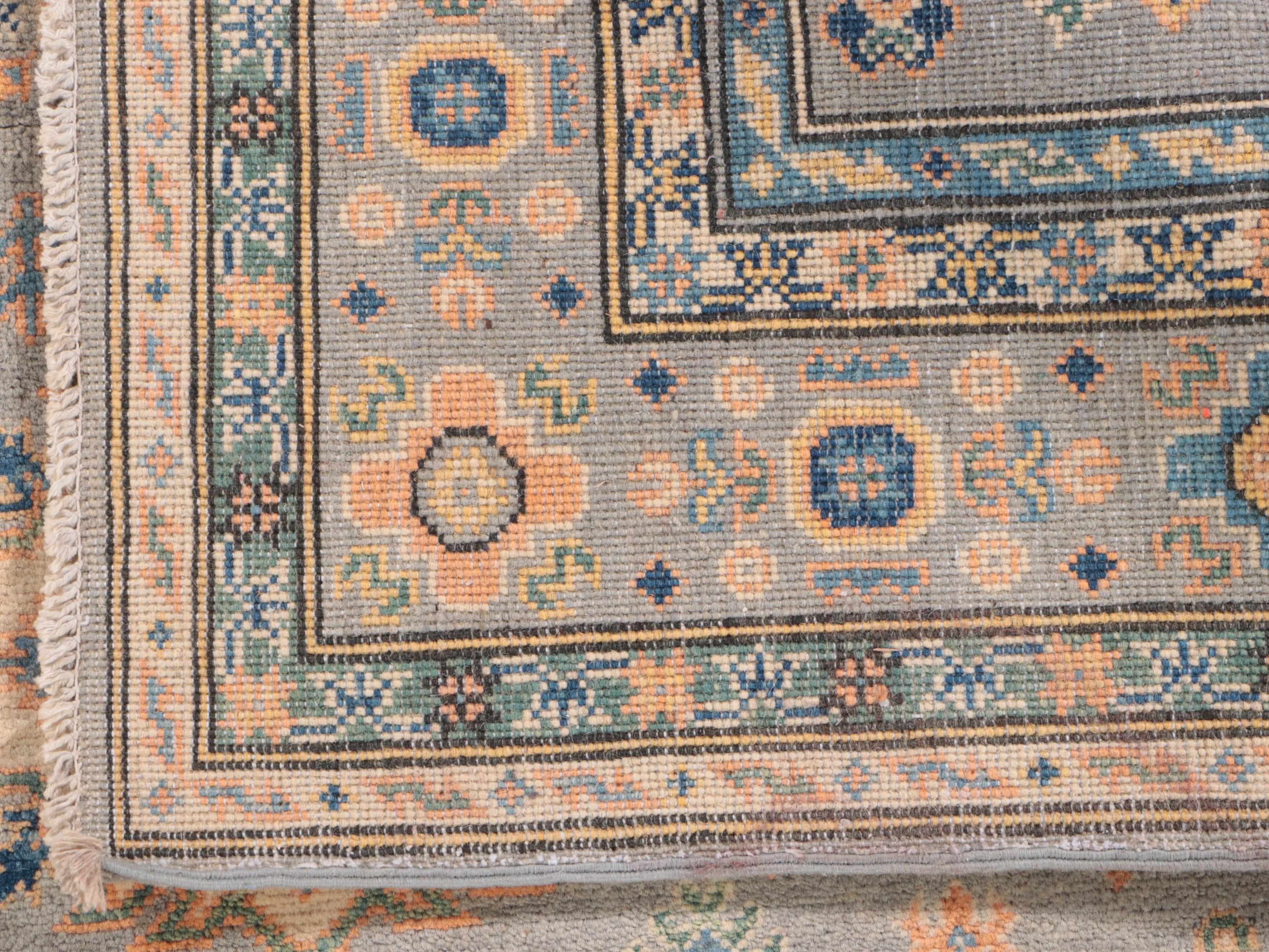 4'9 x 7' Hand-Knotted Pakistani Kazak-Style Area Rug