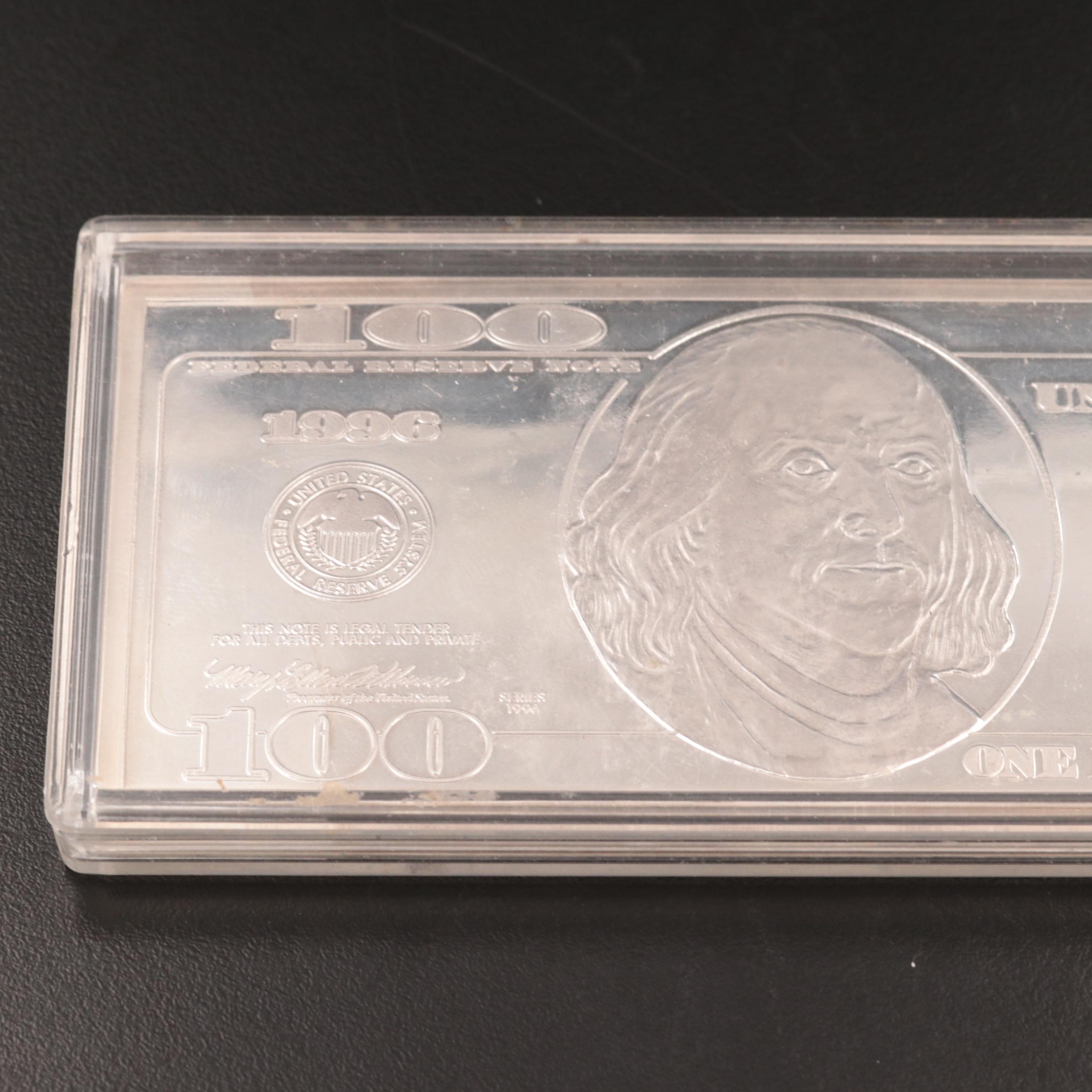 Four Ounce .999 $100 Silver Bar and 1886 Seated Liberty Dime