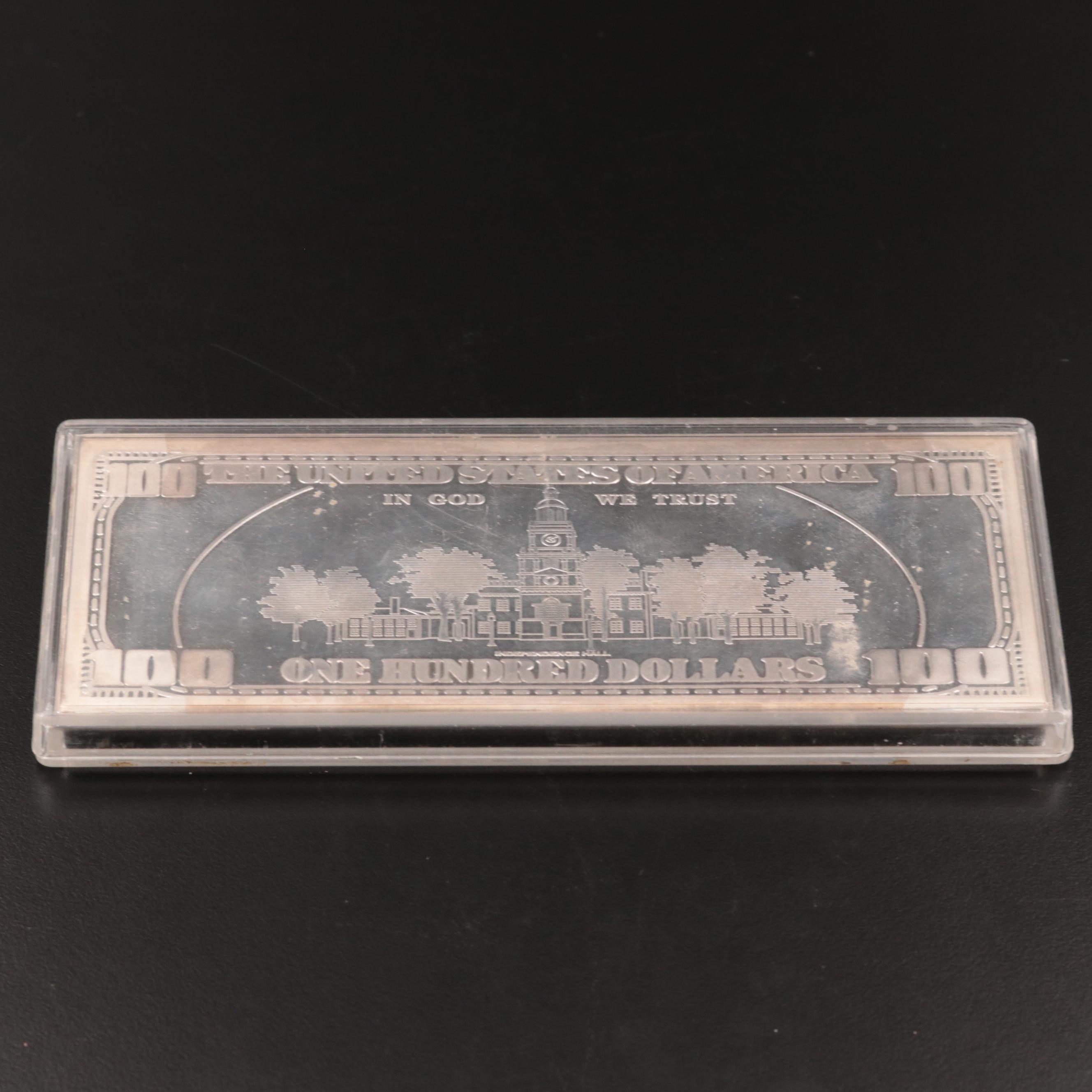 Four Ounce .999 $100 Silver Bar and 1886 Seated Liberty Dime