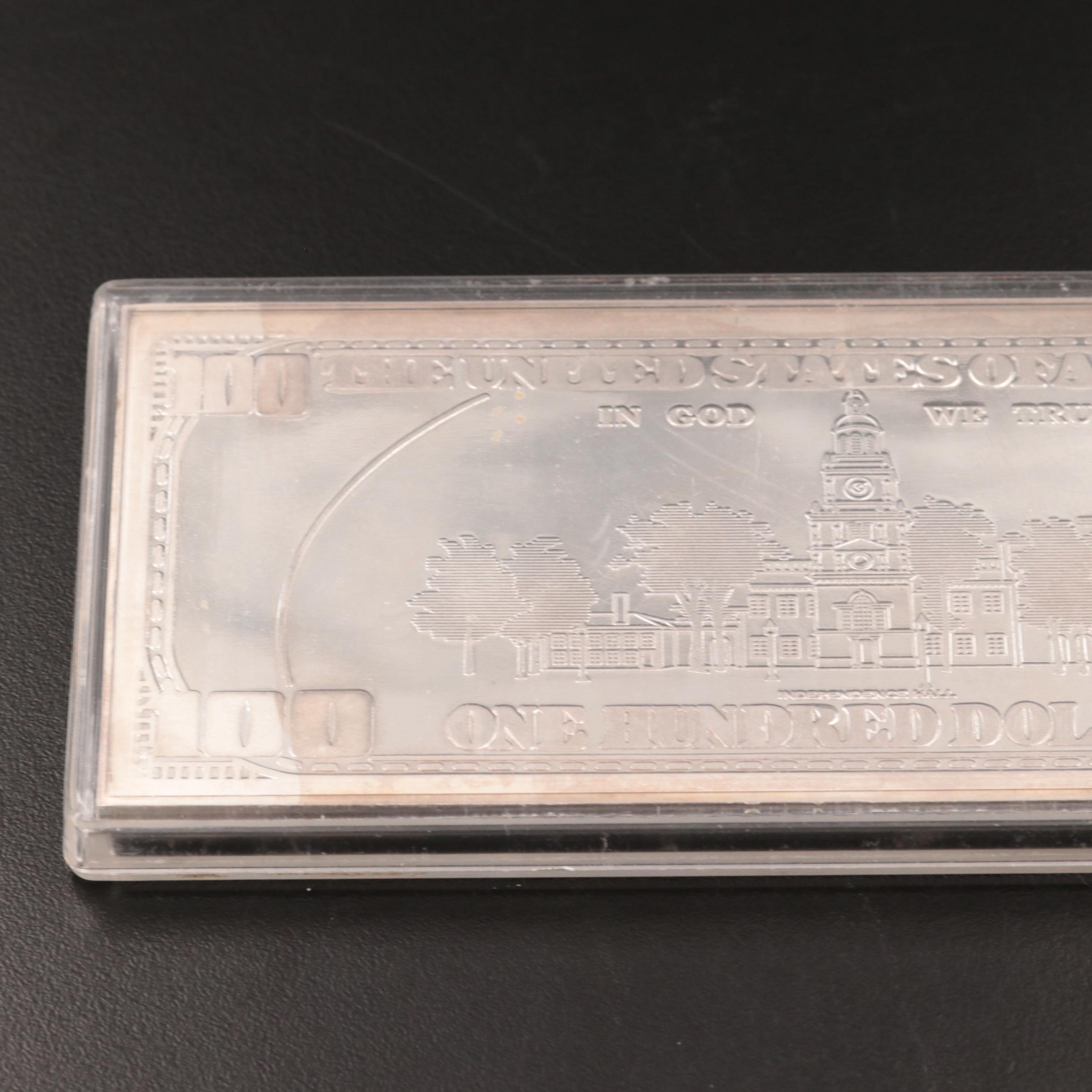 Four Ounce .999 $100 Silver Bar and 1886 Seated Liberty Dime