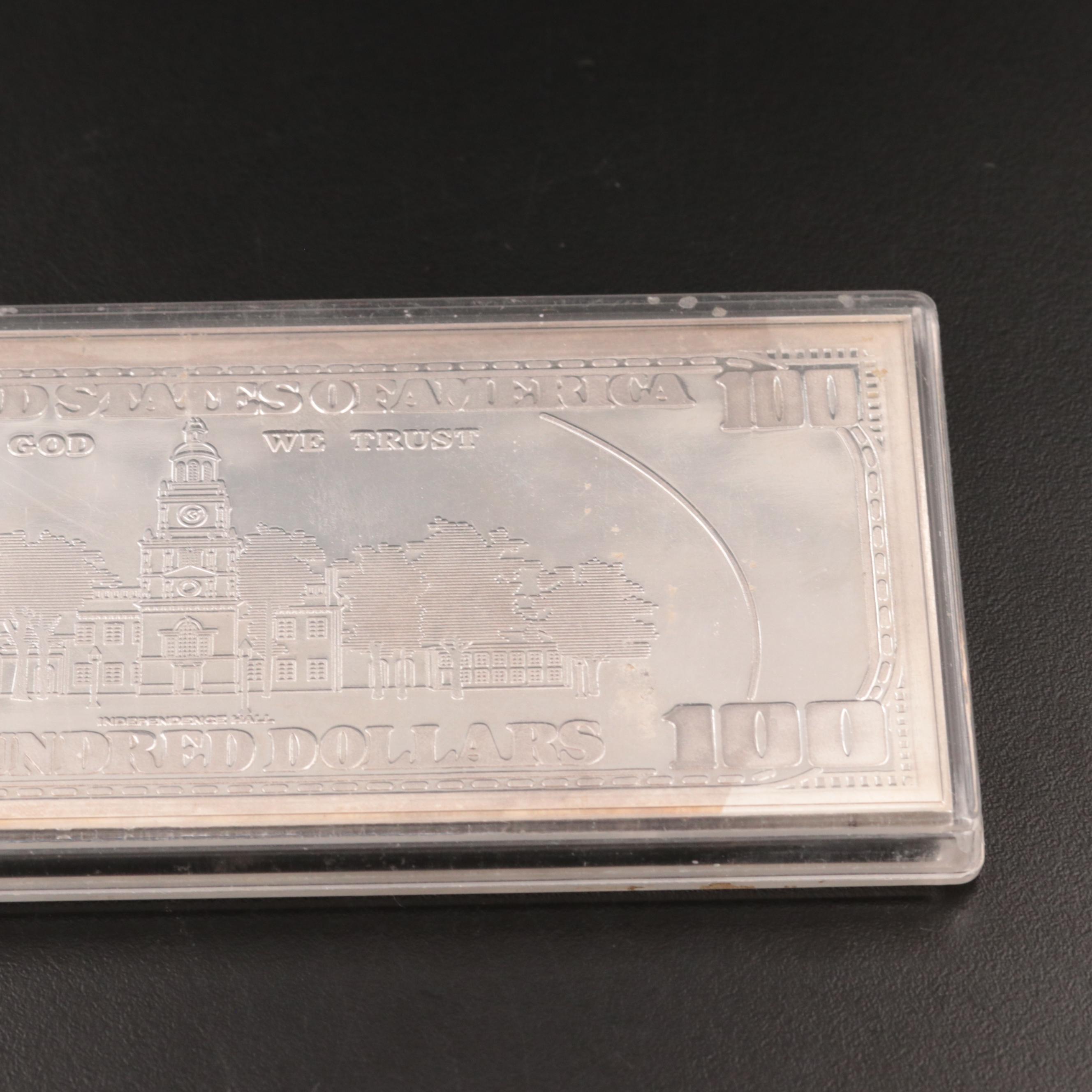 Four Ounce .999 $100 Silver Bar and 1886 Seated Liberty Dime