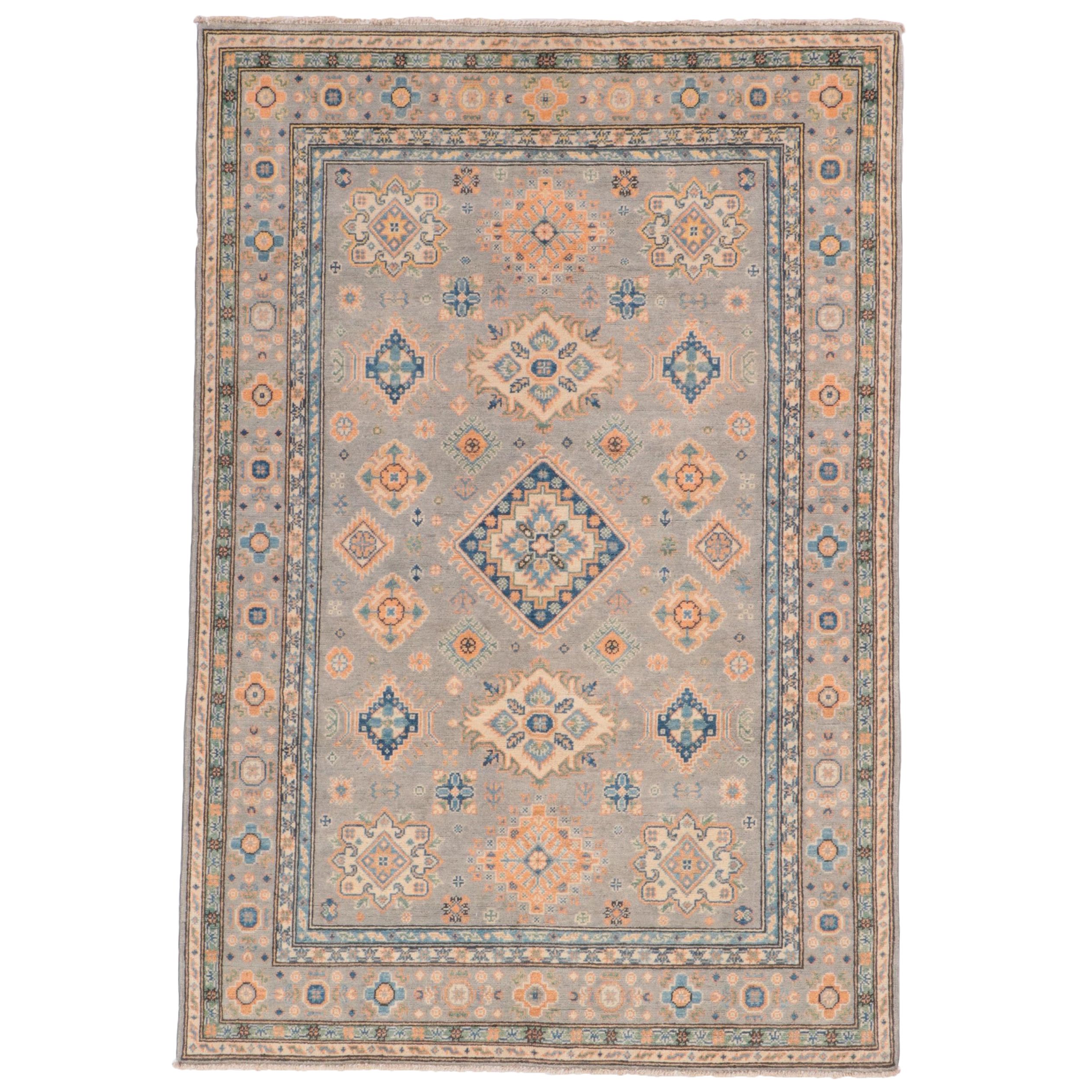 4'9 x 7' Hand-Knotted Pakistani Kazak-Style Area Rug