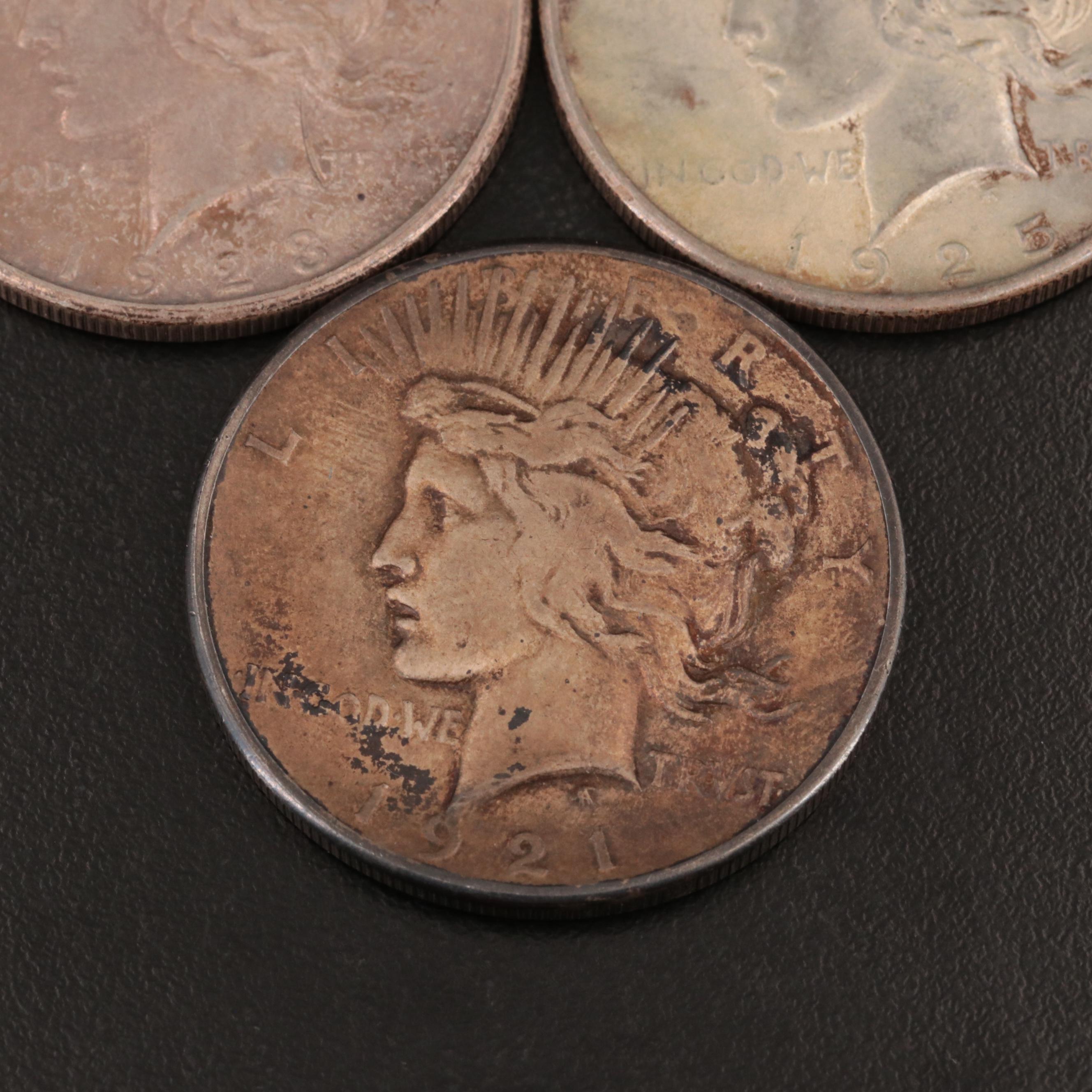Group of Three United States Peace Silver Dollars Including a 1921