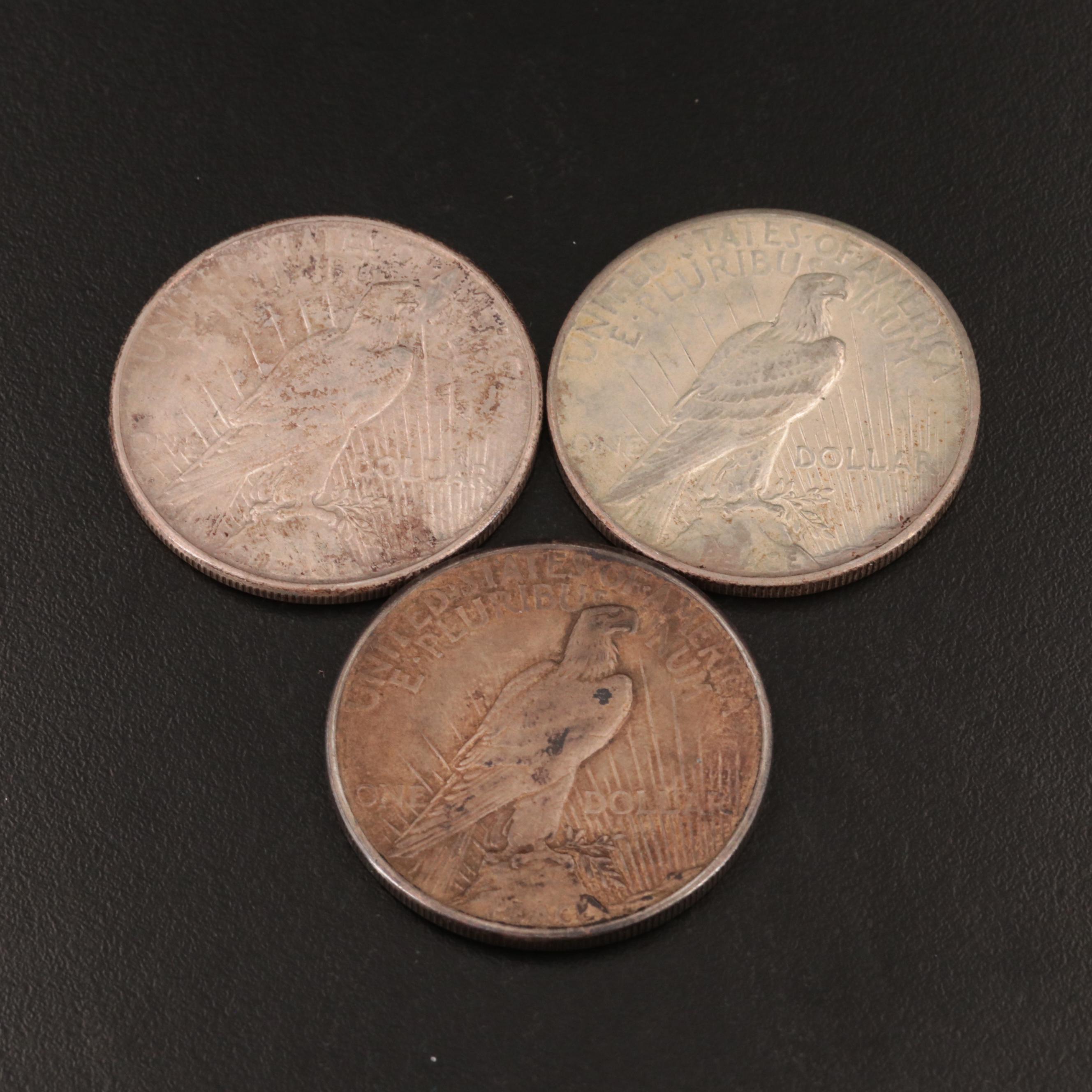 Group of Three United States Peace Silver Dollars Including a 1921