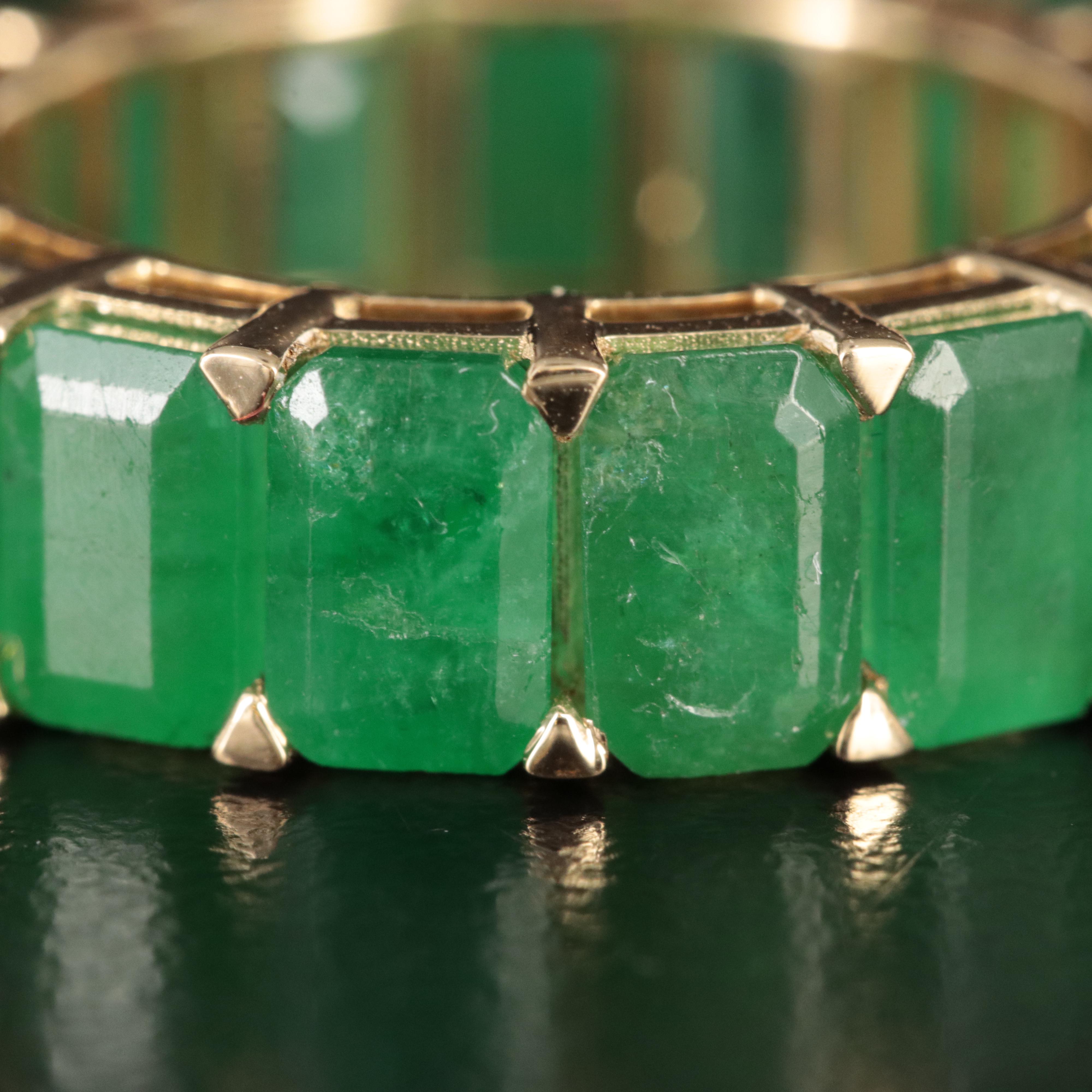 18K 10.26 CTW Emerald Eternity Band
