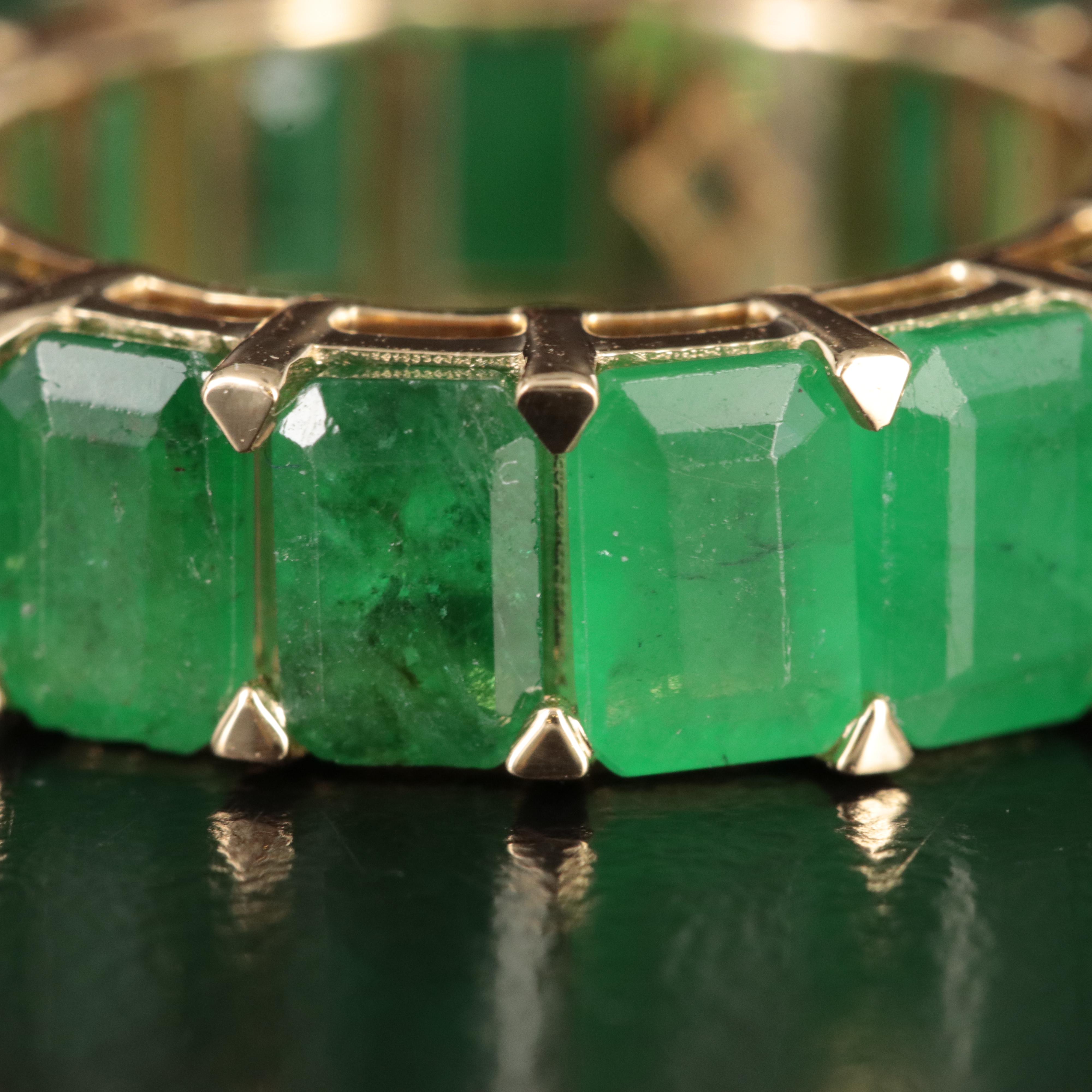 18K 10.26 CTW Emerald Eternity Band