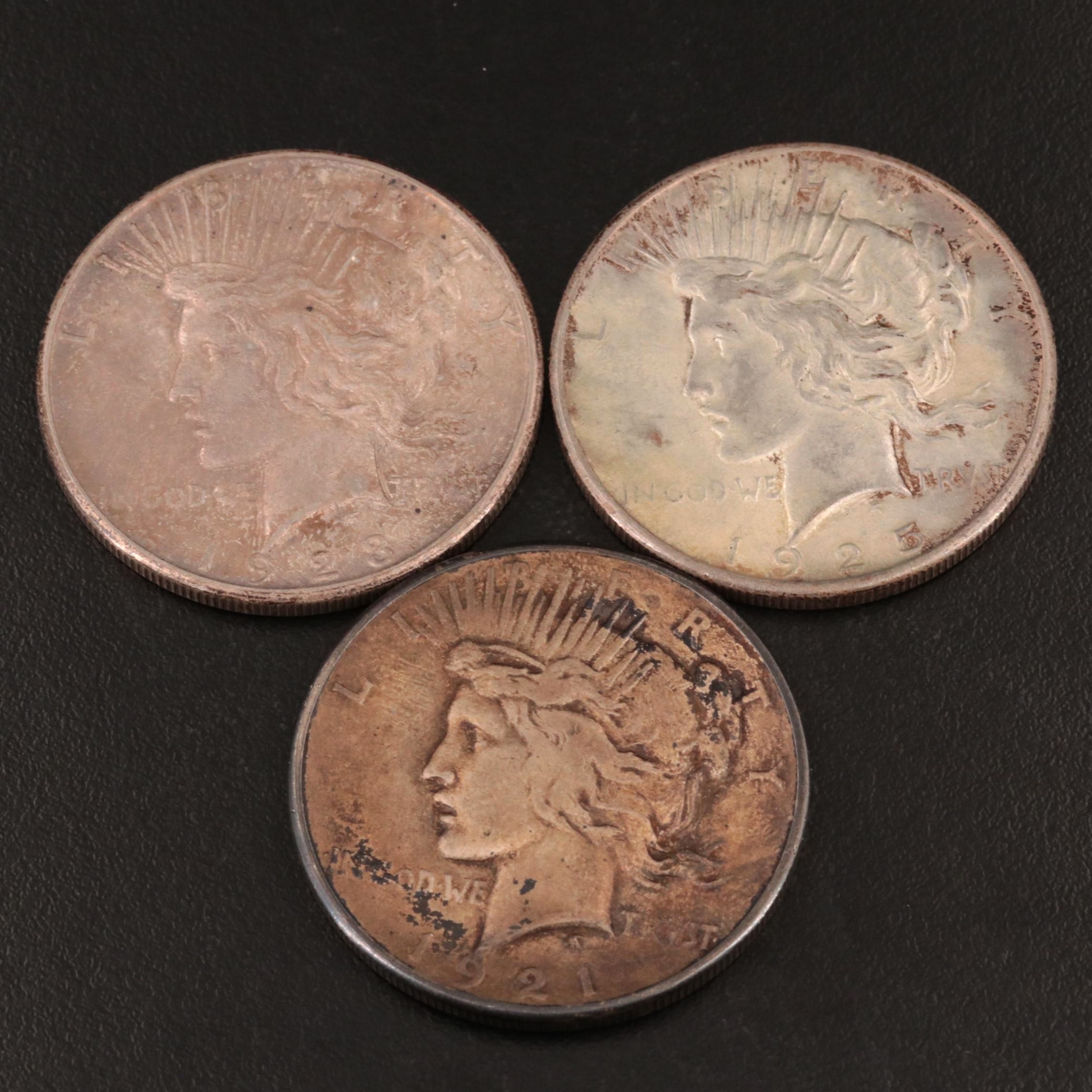 Group of Three United States Peace Silver Dollars Including a 1921