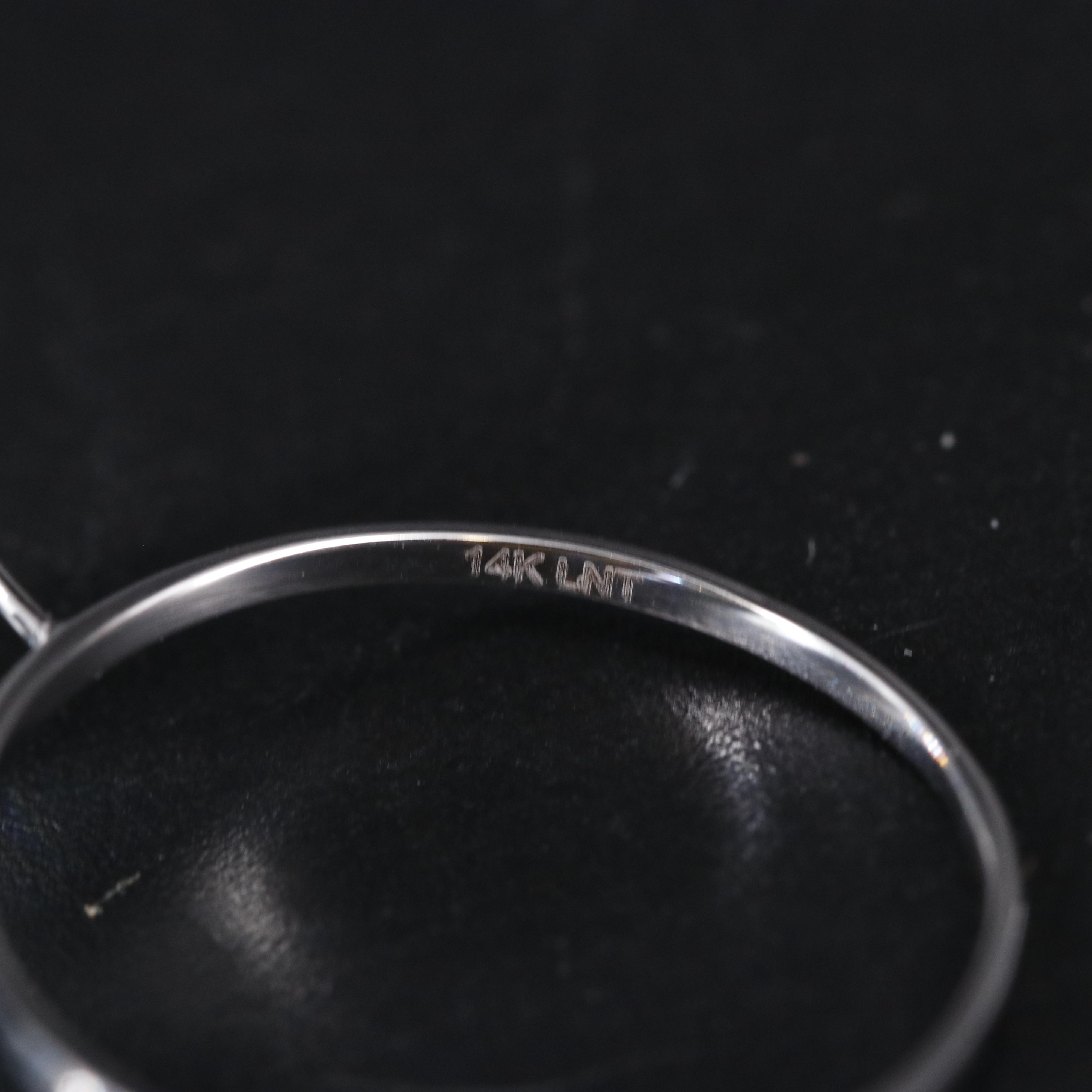 14K Blue Topaz and Moissanite Ring