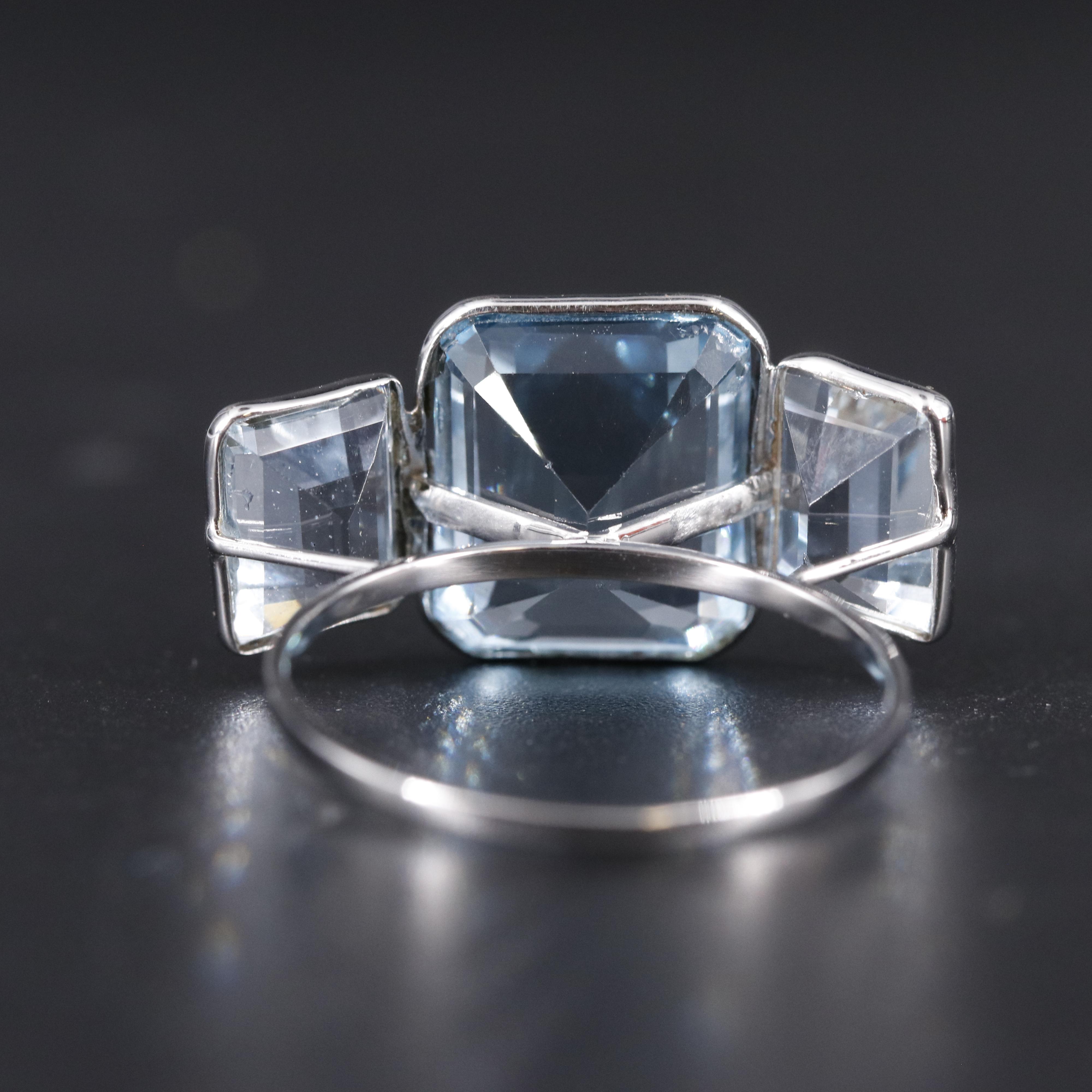 14K Blue Topaz and Moissanite Ring