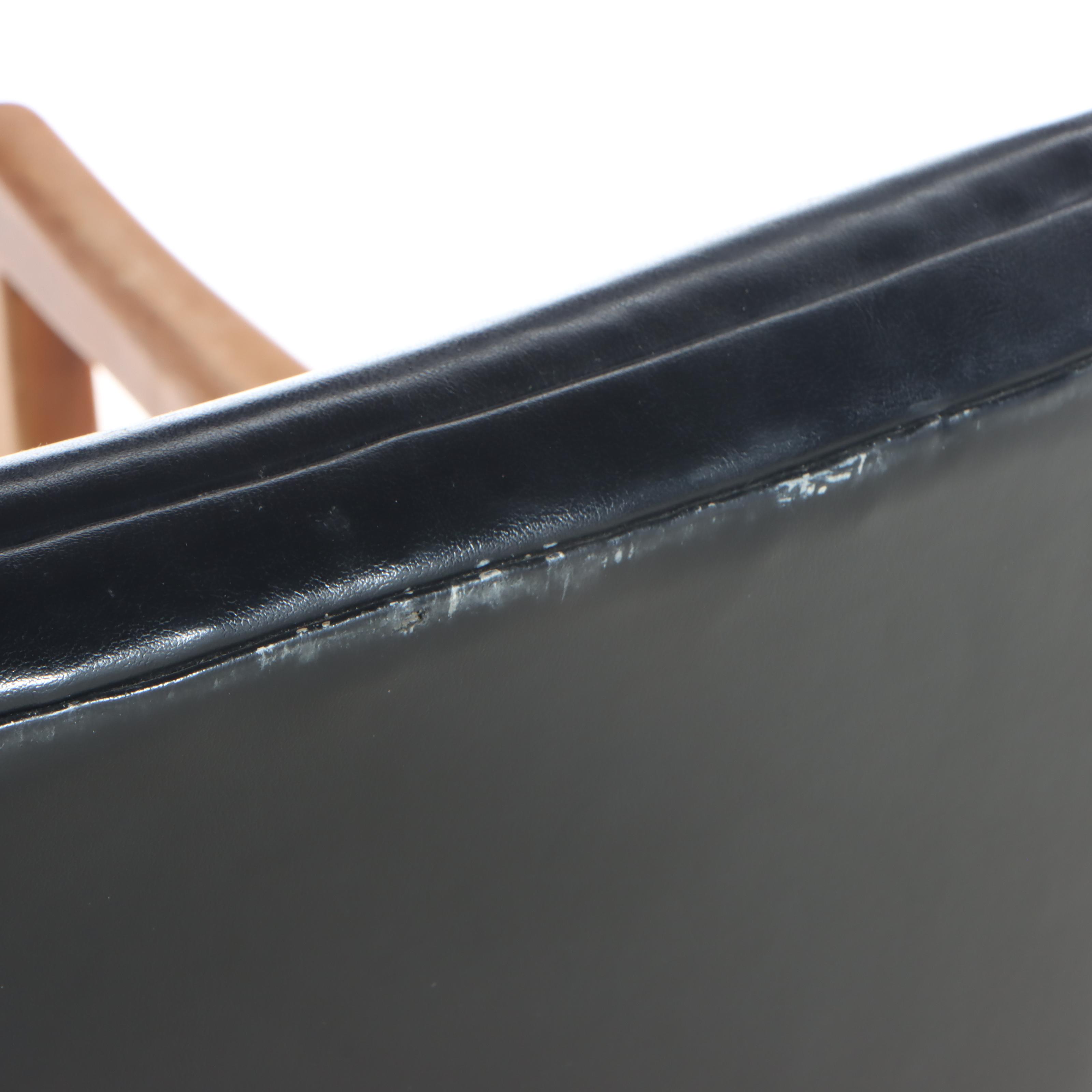 W. H. Gunlocke Mid Century Modern Wood and Vinyl Rolling Desk Chair