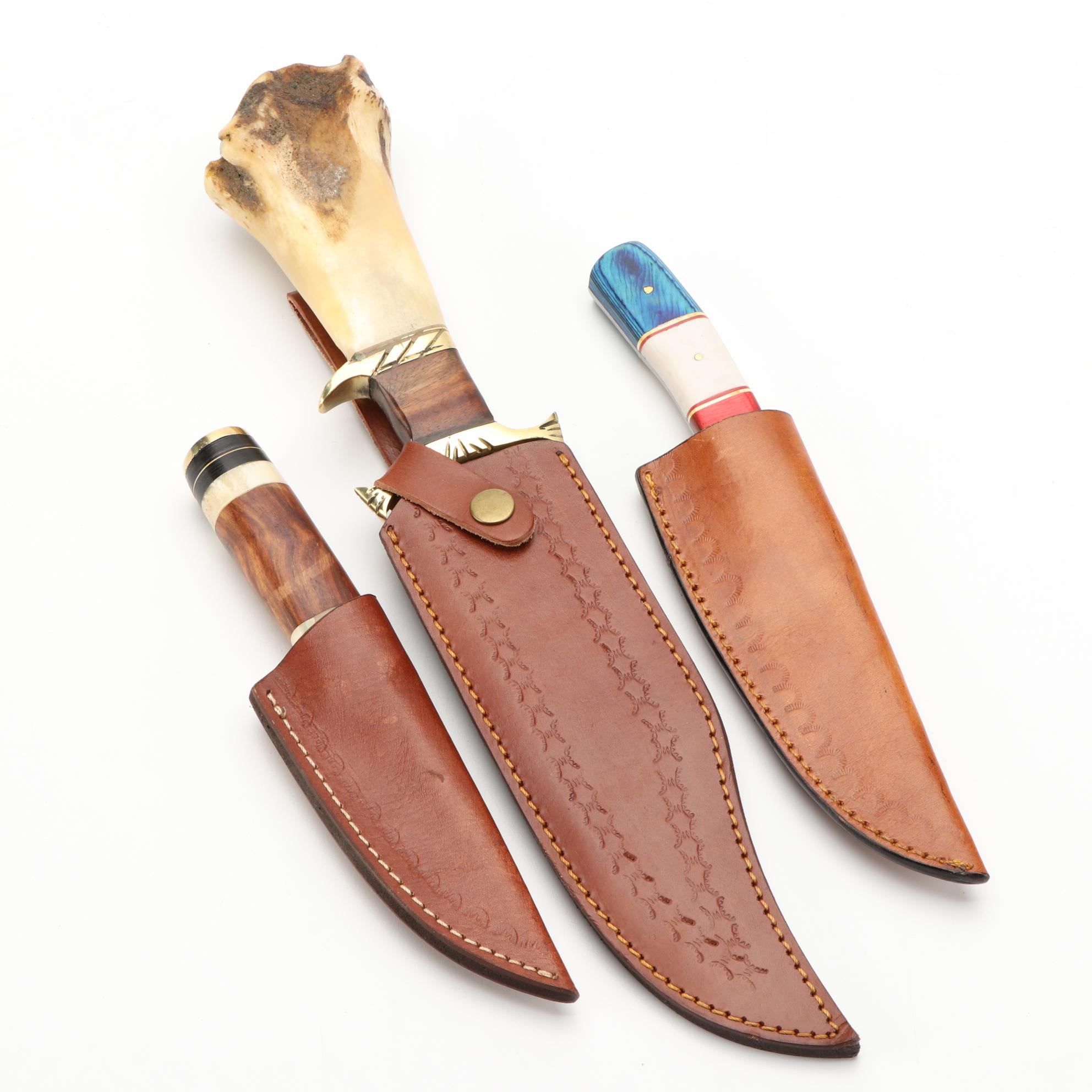 Three Damascus Steel, Wood, and Bone Handled Fixed Blade Knives with Scabbards