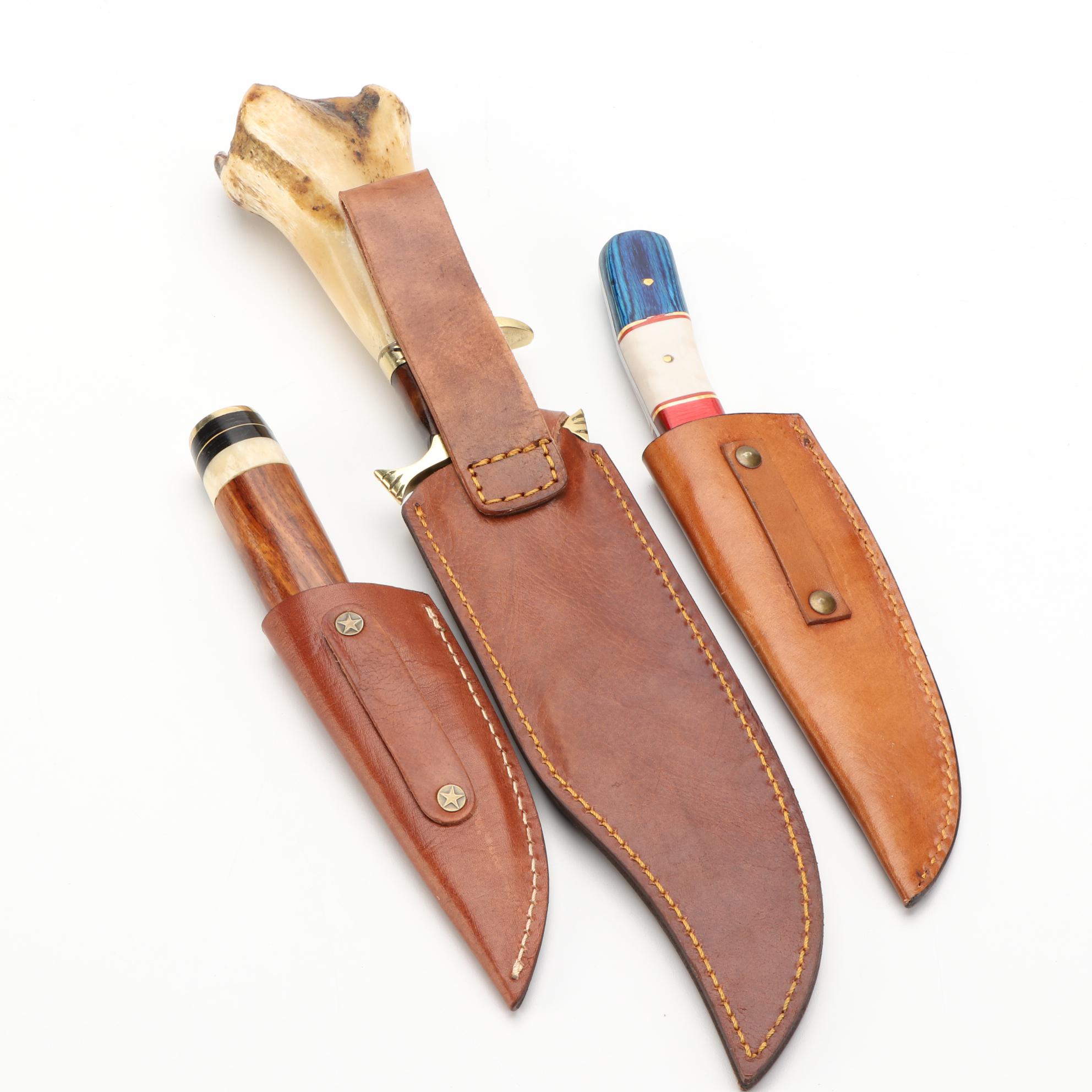 Three Damascus Steel, Wood, and Bone Handled Fixed Blade Knives with Scabbards
