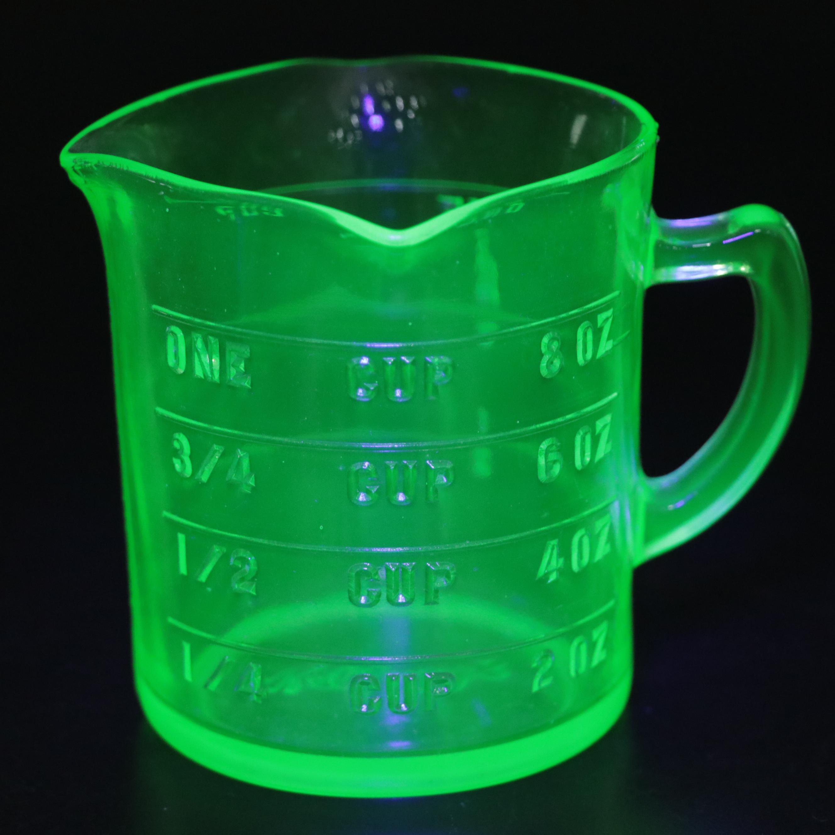 T & S Handimade Measuring Cup with Beater Attachment with Other Uranium Glass