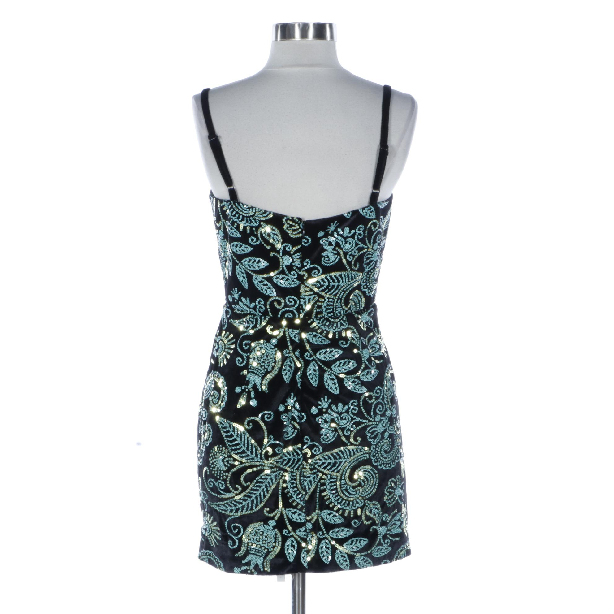 Cosmopolitan Sequined Sleeveless Dress and Bebe Studded Finge Vest