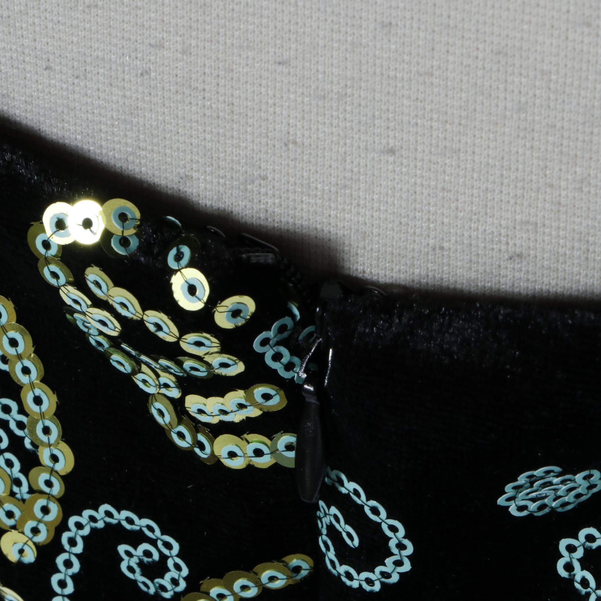 Cosmopolitan Sequined Sleeveless Dress and Bebe Studded Finge Vest