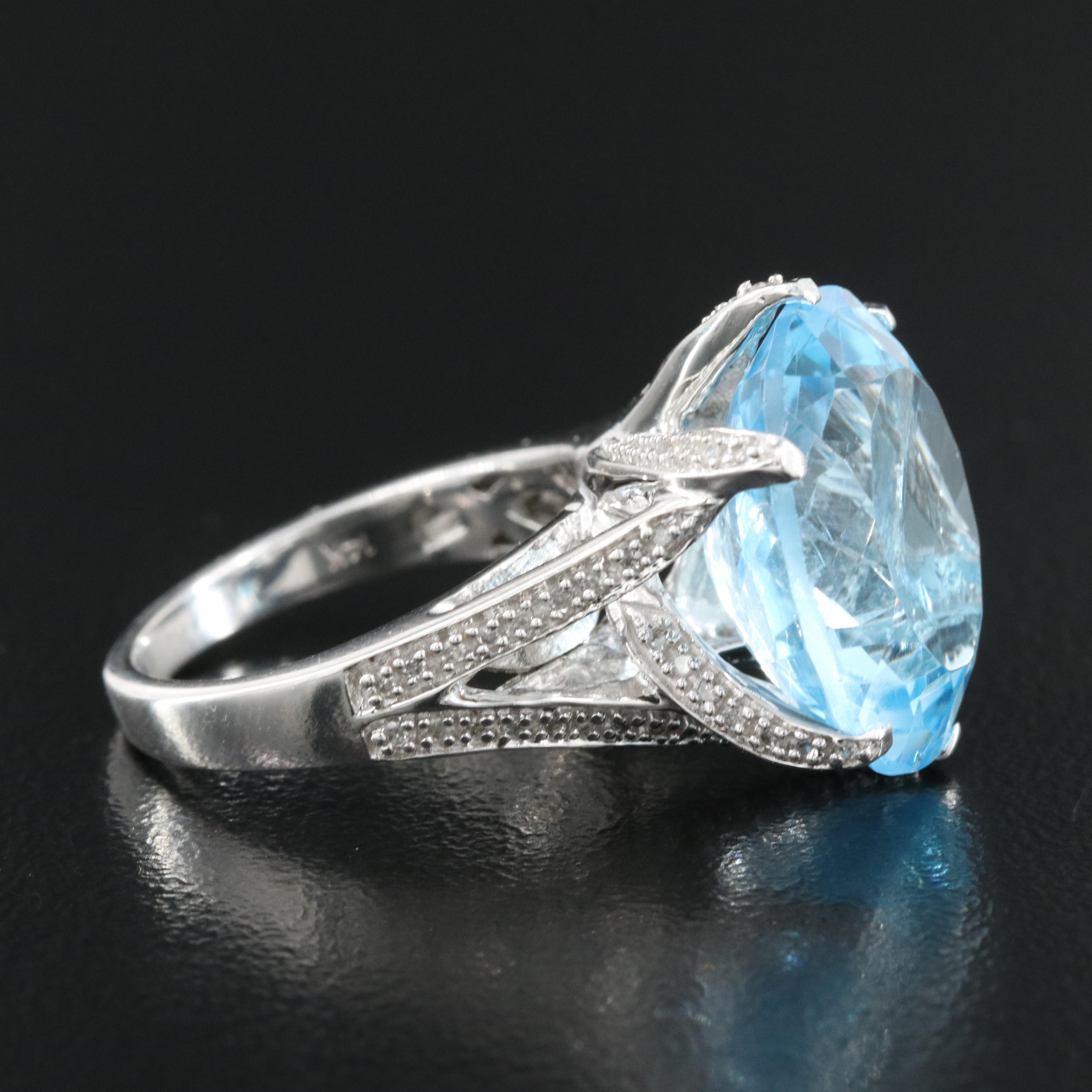 14K 17.84 CT Sky Blue Topaz and Diamond Ring
