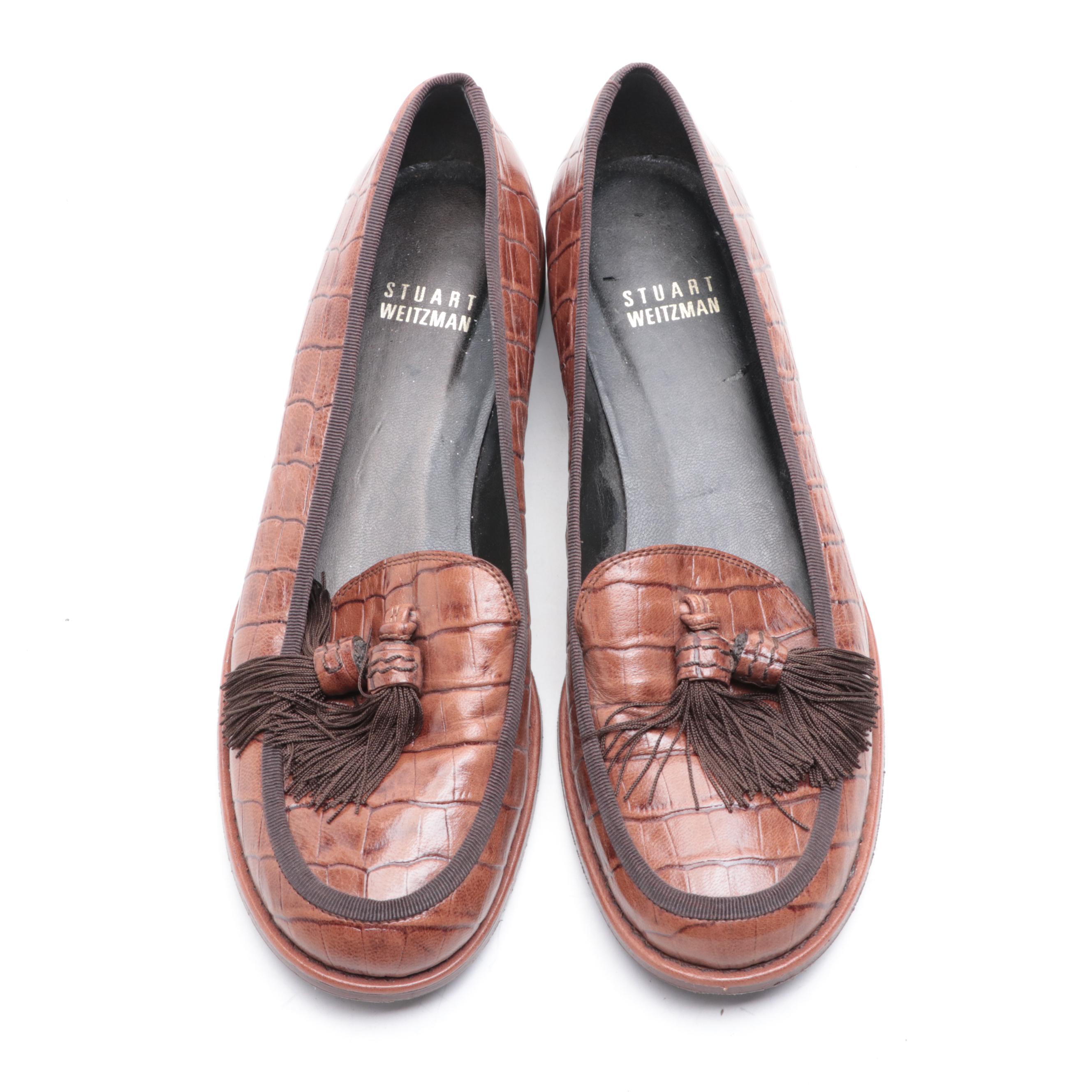 Stuart Weitzman Embossed Leather Loafers and Tory Burch Flip-Flops