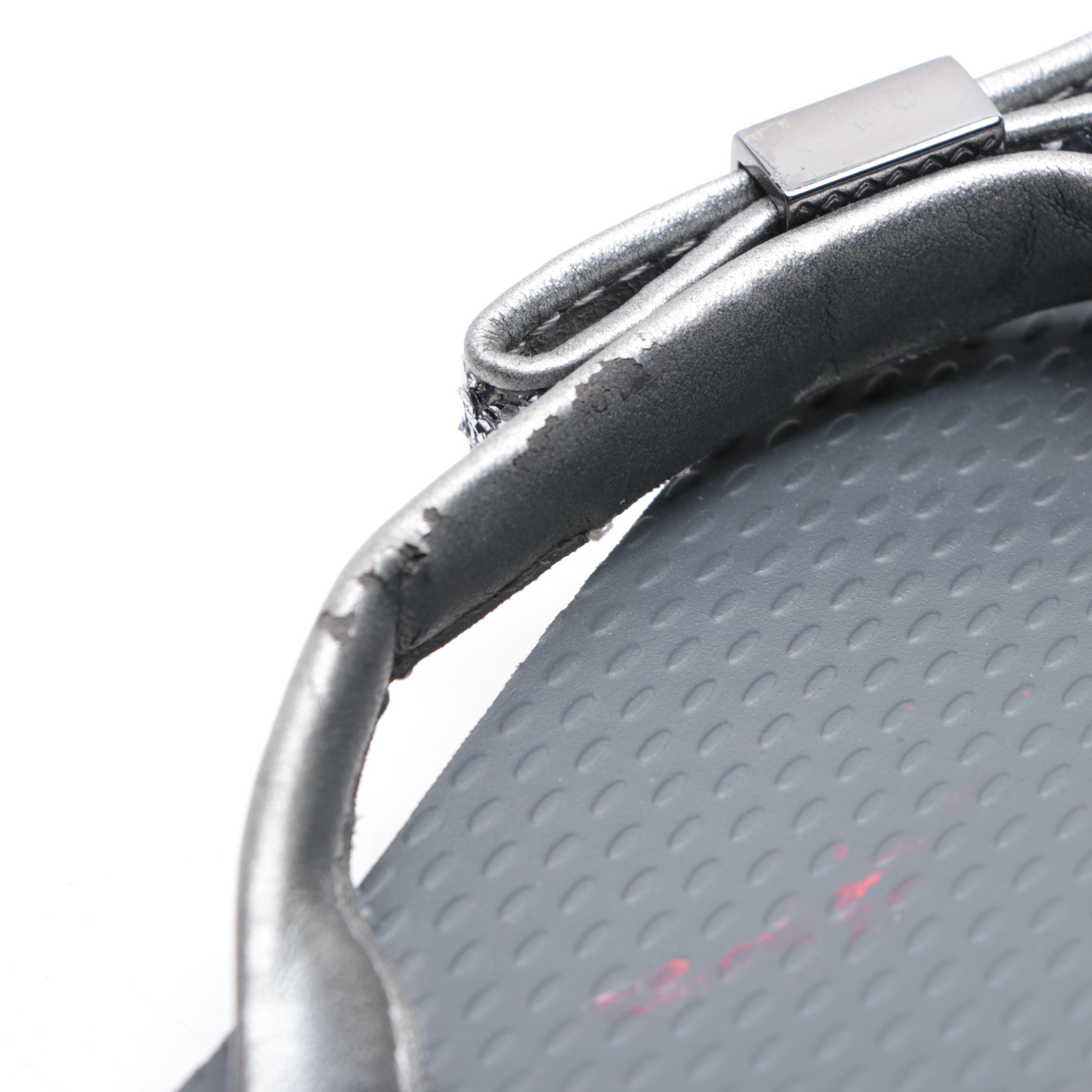 Stuart Weitzman Embossed Leather Loafers and Tory Burch Flip-Flops