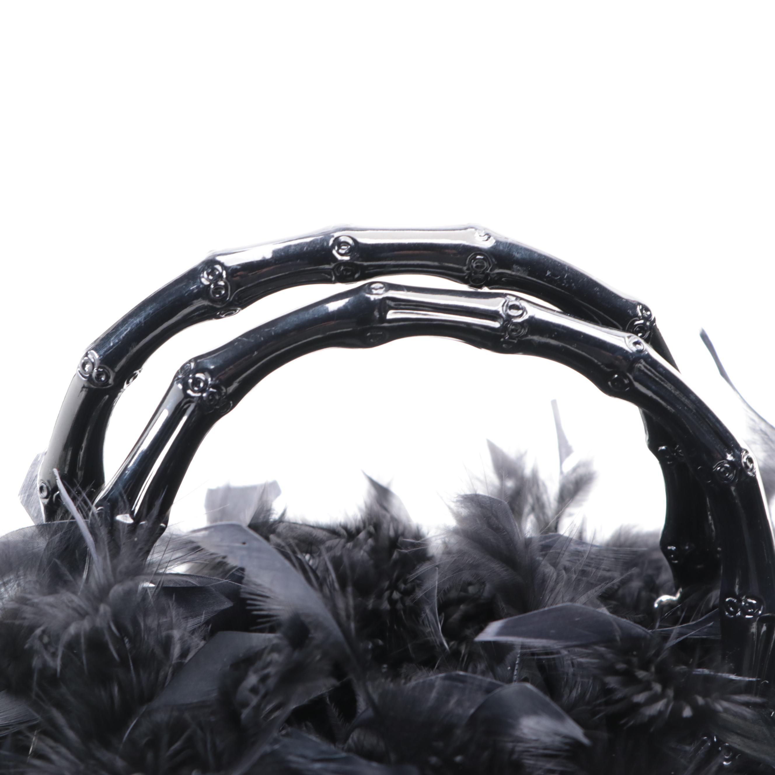 Textile Handbags with Lacquered Bamboo Handles and Feather Trim