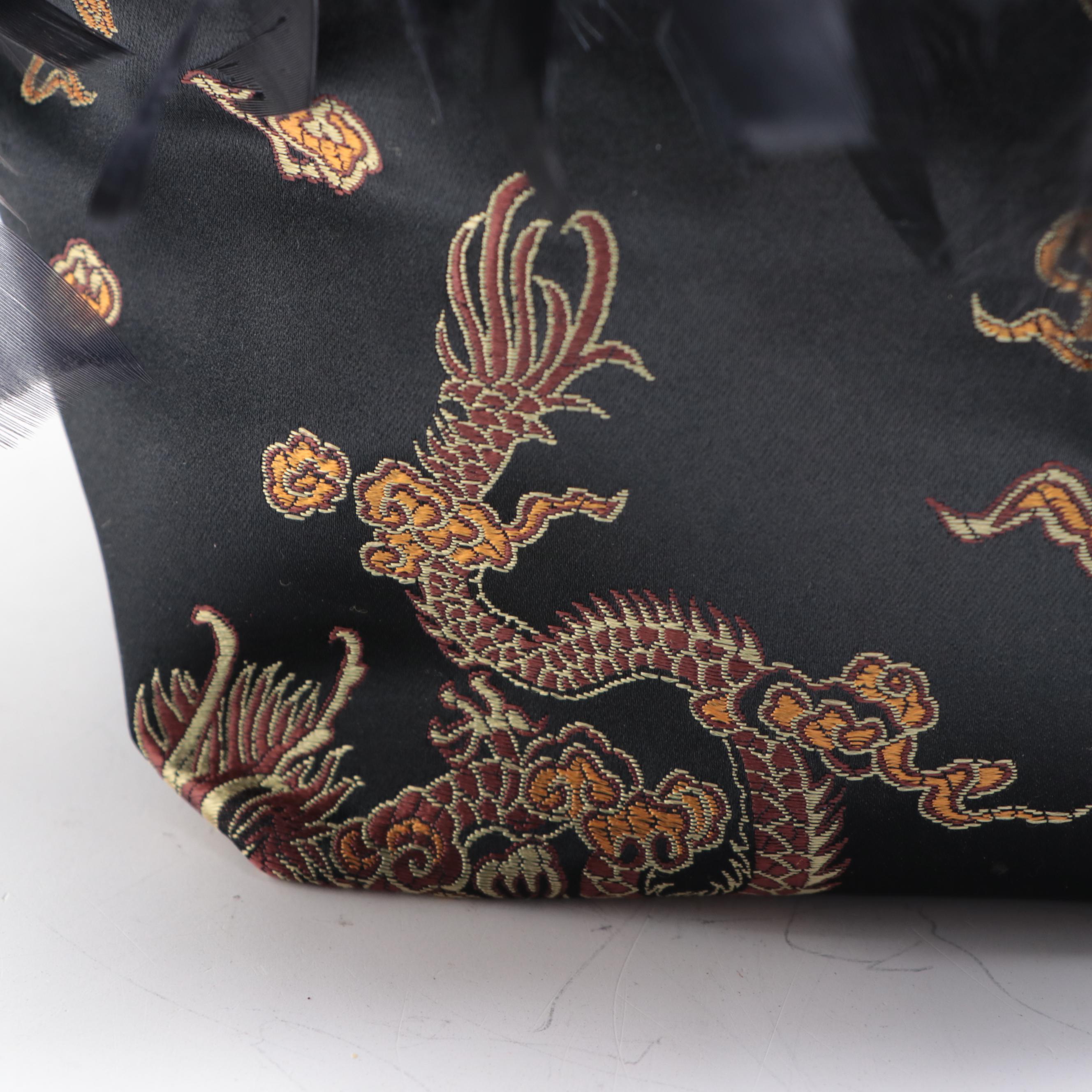 Textile Handbags with Lacquered Bamboo Handles and Feather Trim