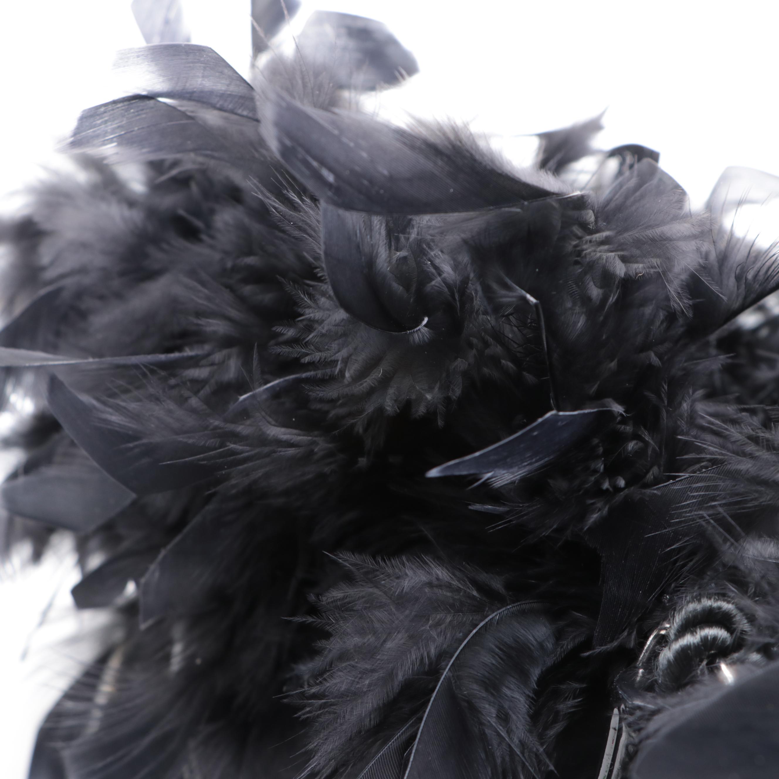 Textile Handbags with Lacquered Bamboo Handles and Feather Trim