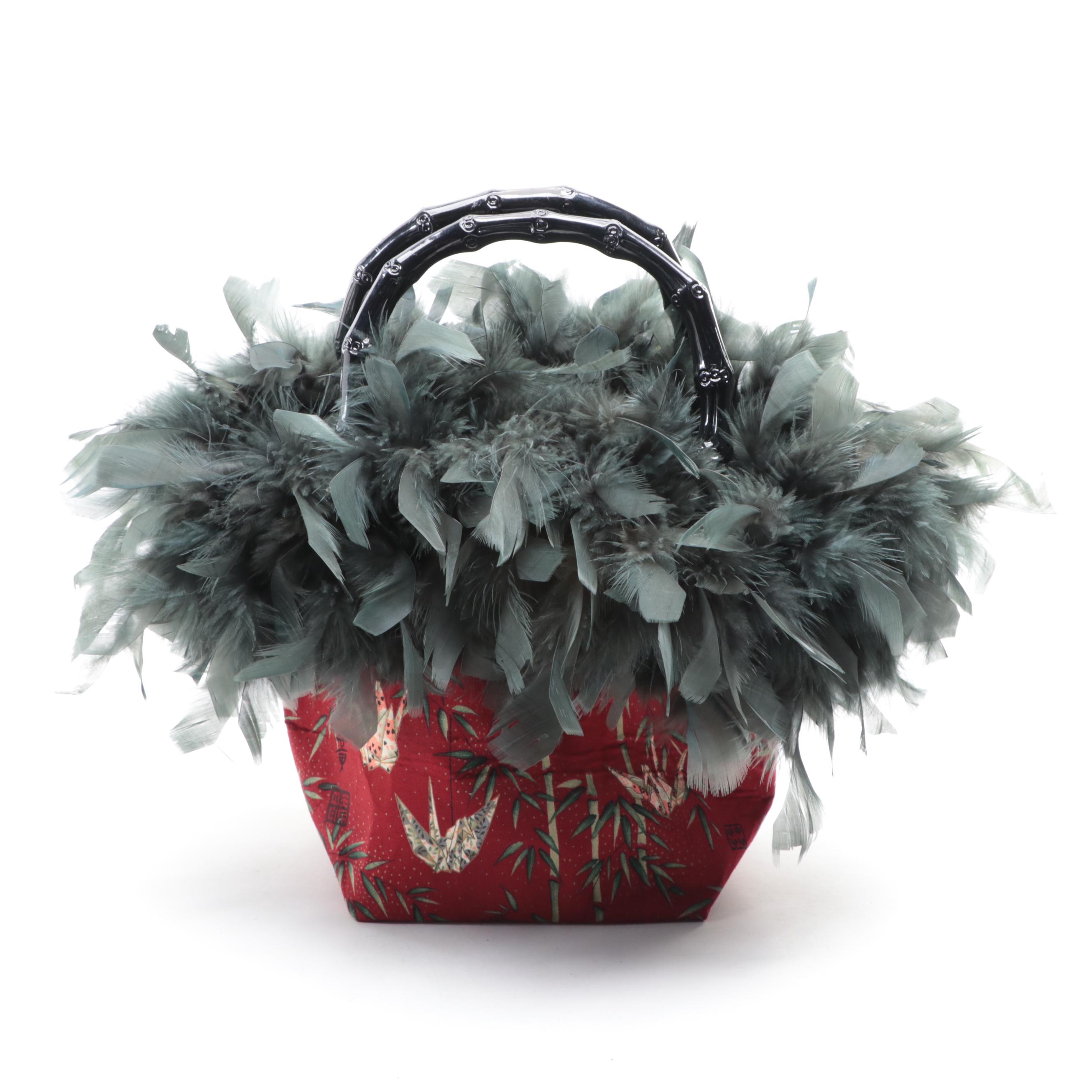 Textile Handbags with Lacquered Bamboo Handles and Feather Trim