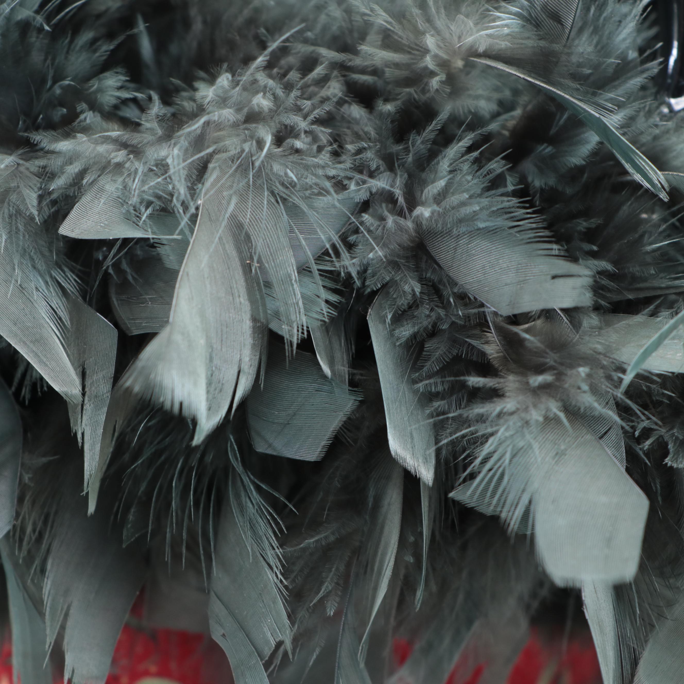 Textile Handbags with Lacquered Bamboo Handles and Feather Trim