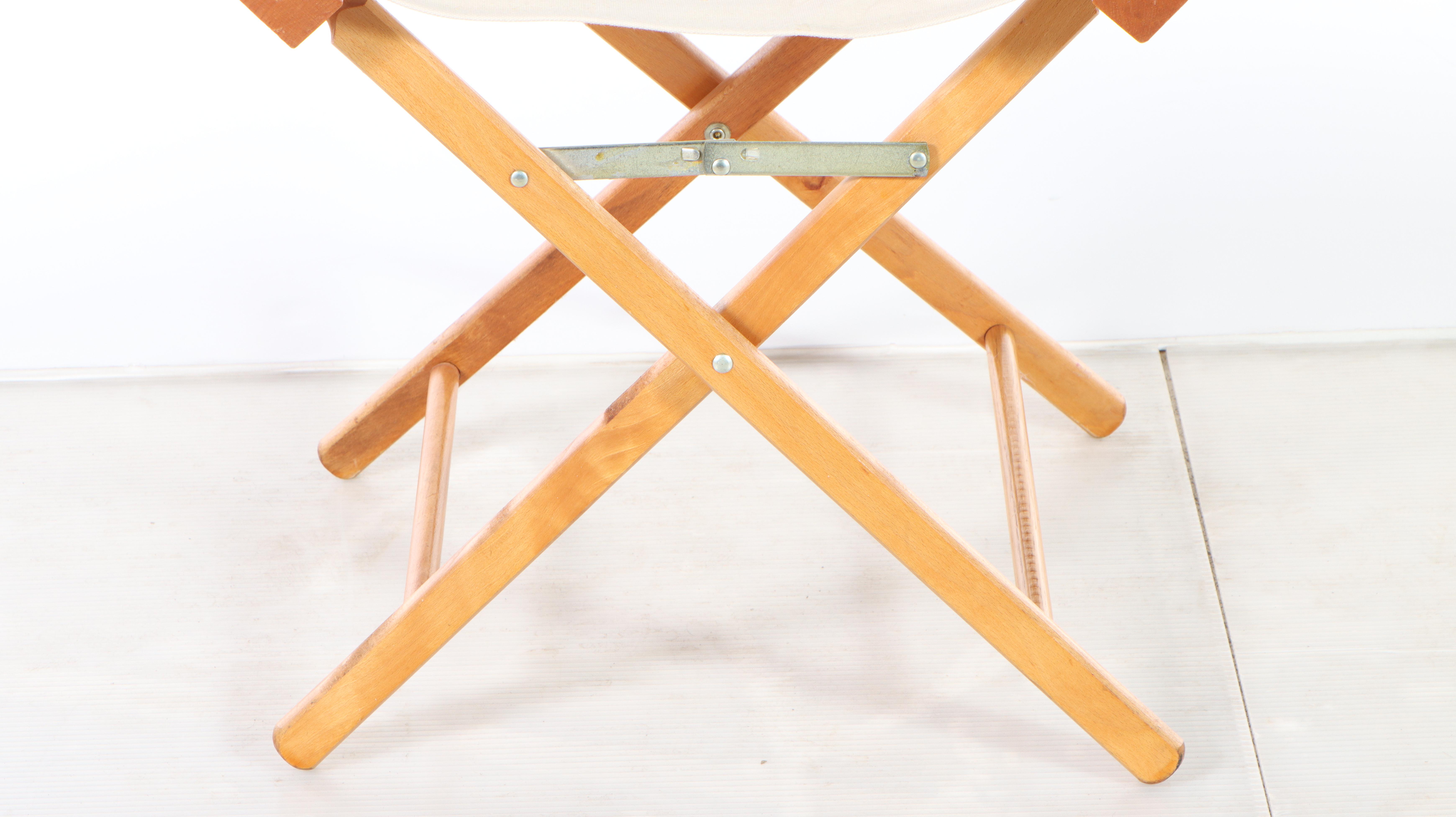 Five Wood and Canvas Folding Director's Chairs