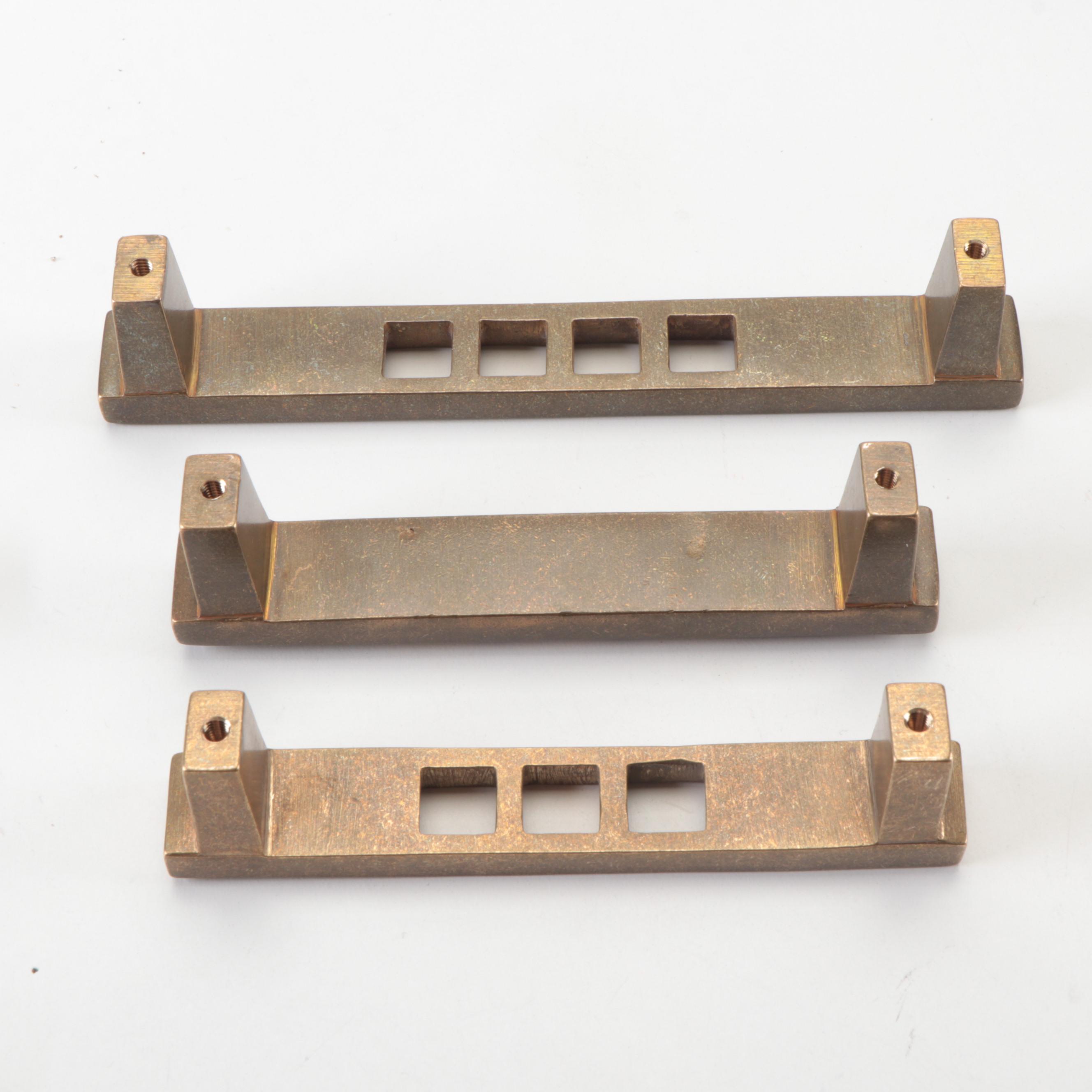 Punched and Embossed Elongated Cabinet Pulls in Natural Bronze Finish