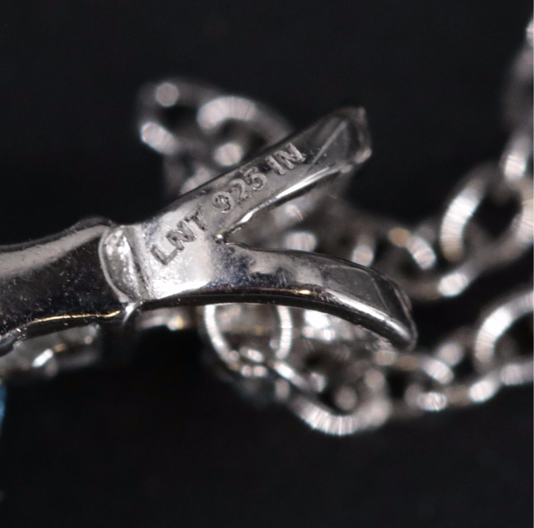 Sterling Silver Pendant Necklace Featuring Topaz