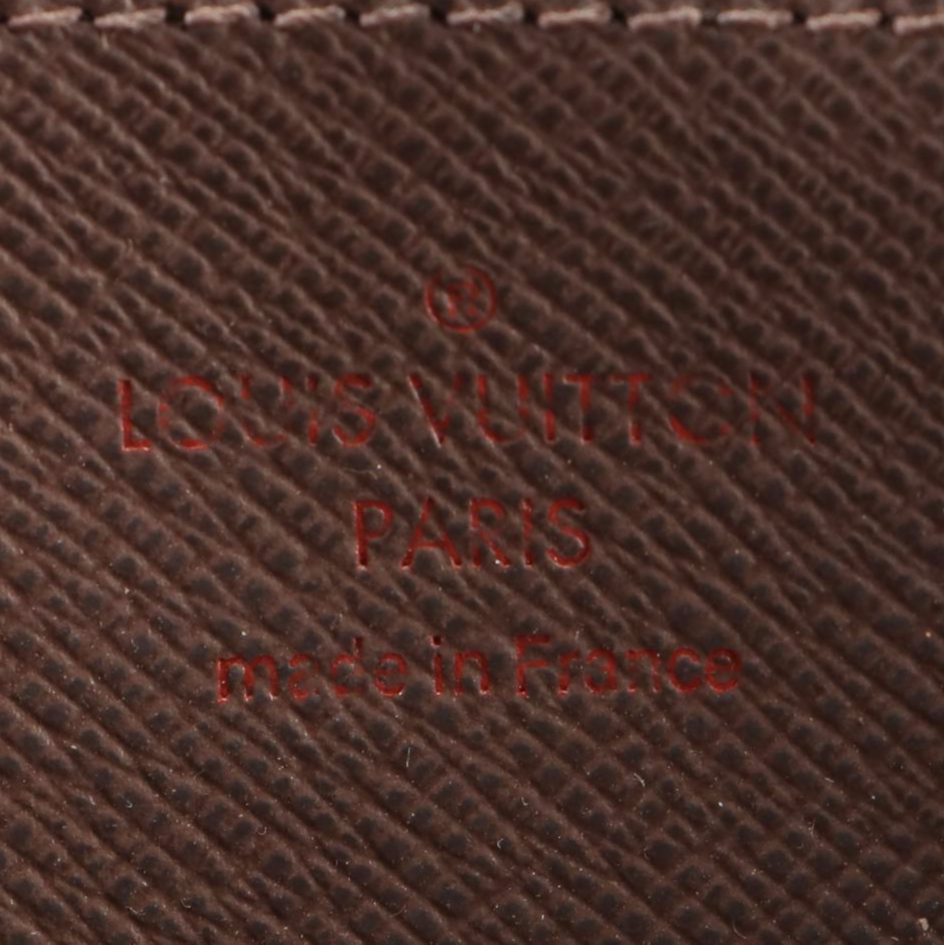 Louis Vuitton Zippy Wallet in Damier Ebene Canvas