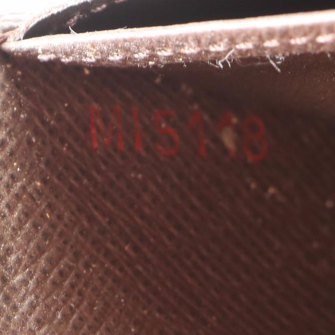 Louis Vuitton Zippy Wallet in Damier Ebene Canvas