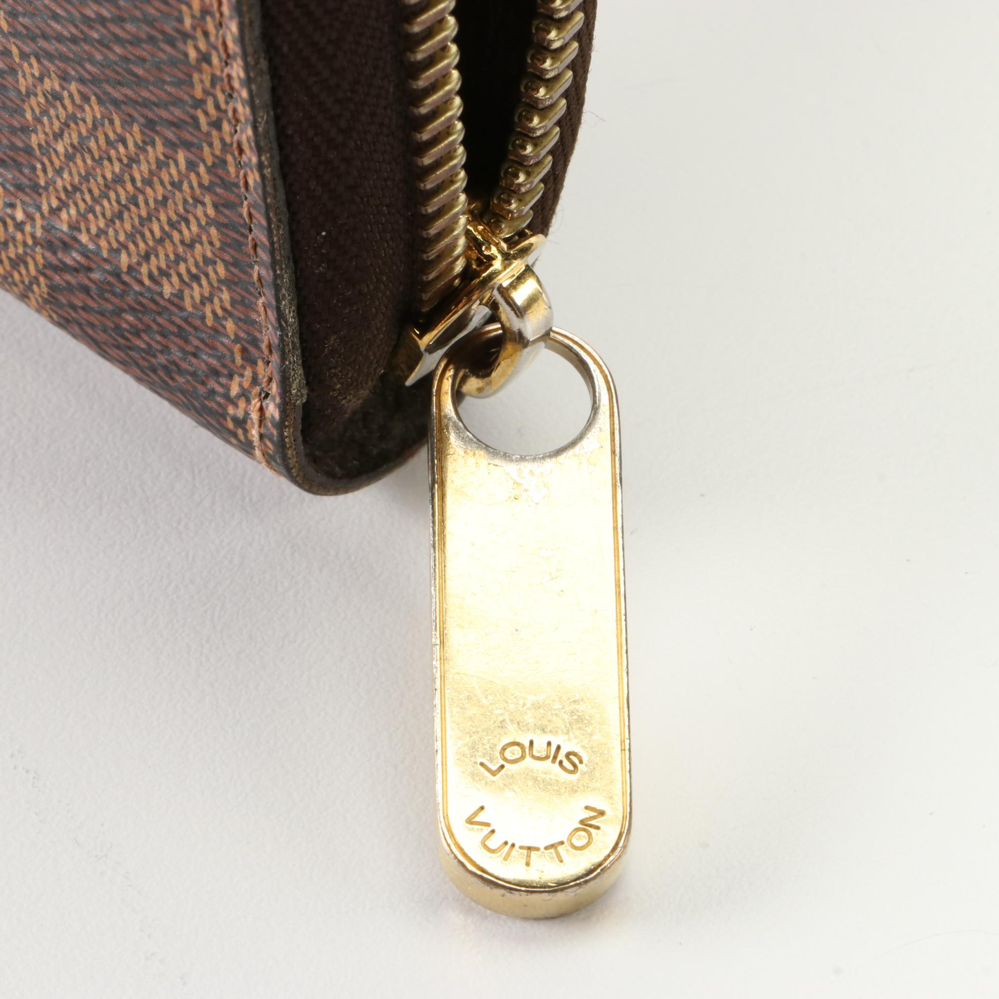 Louis Vuitton Zippy Wallet in Damier Ebene Canvas
