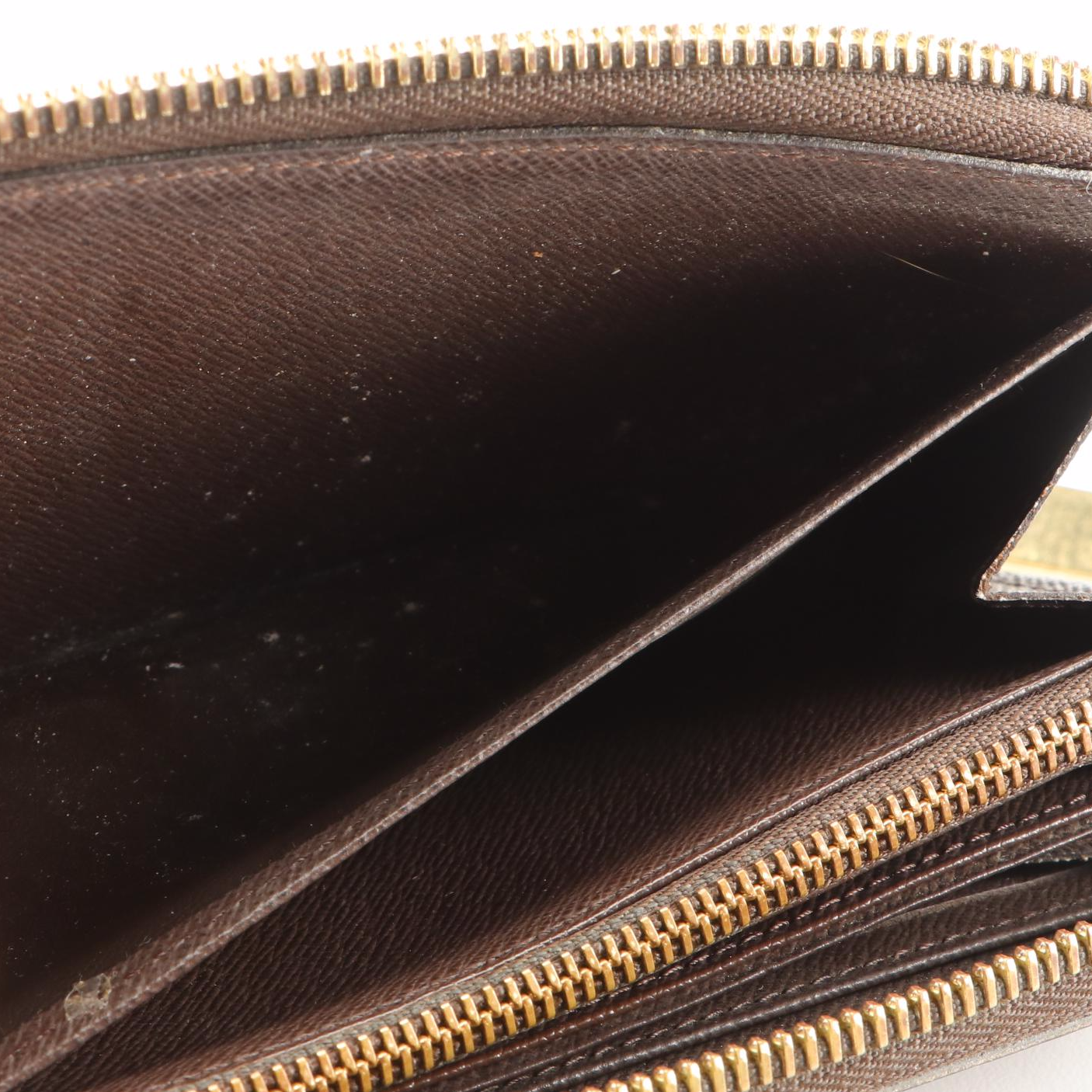 Louis Vuitton Zippy Wallet in Damier Ebene Canvas